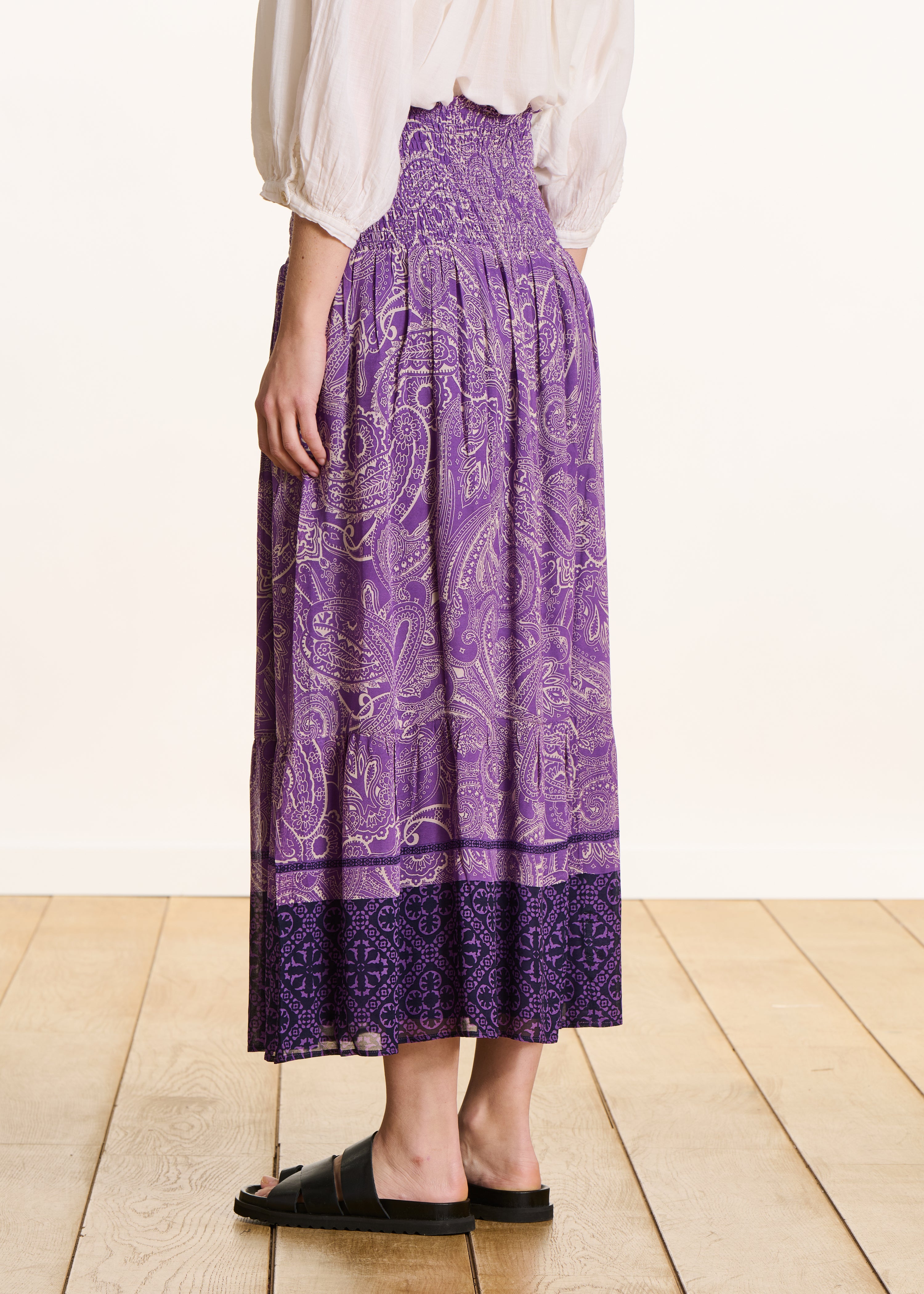 Long purple voile skirt with print and smocking