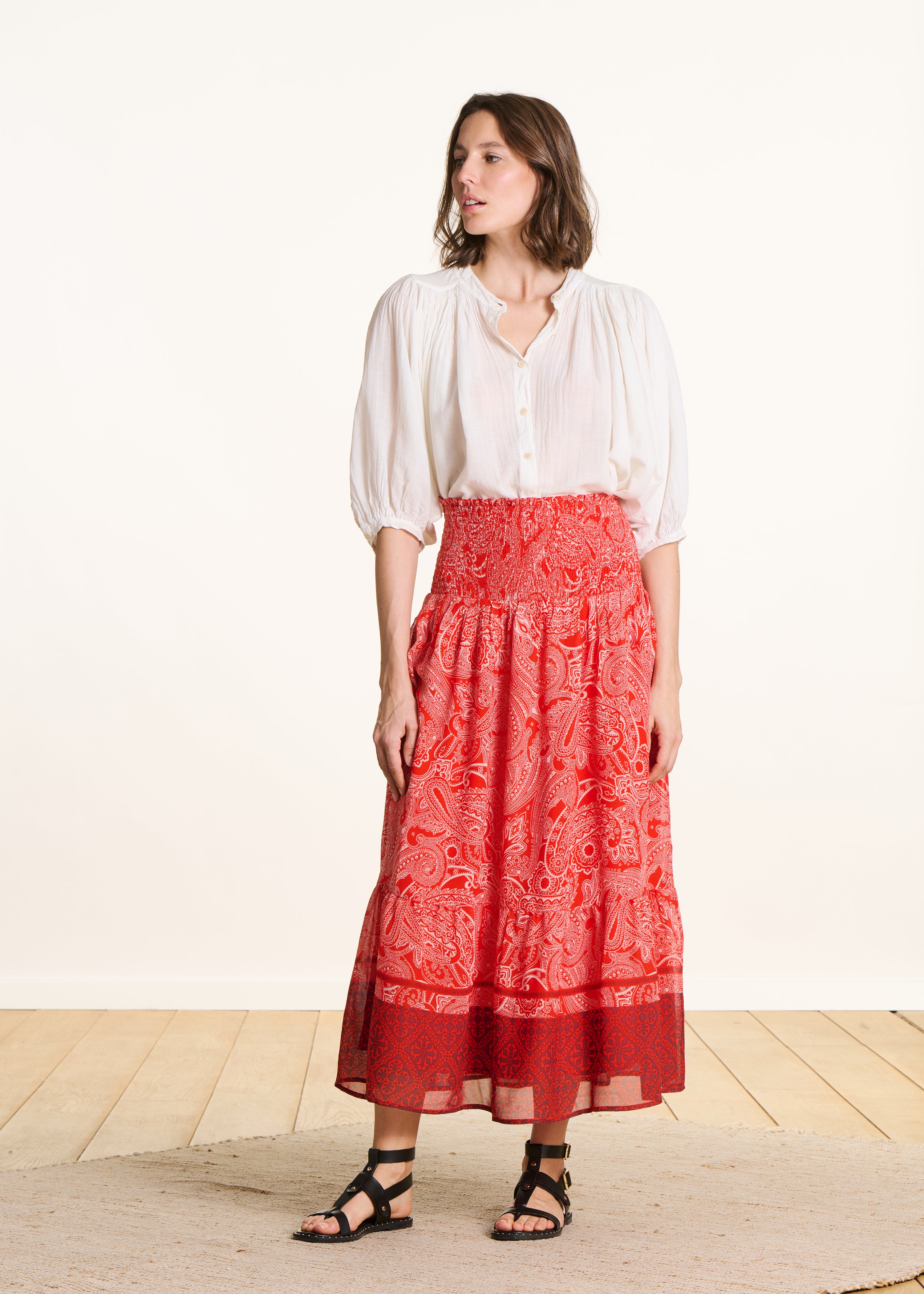 Long orange voile skirt with print and smocking