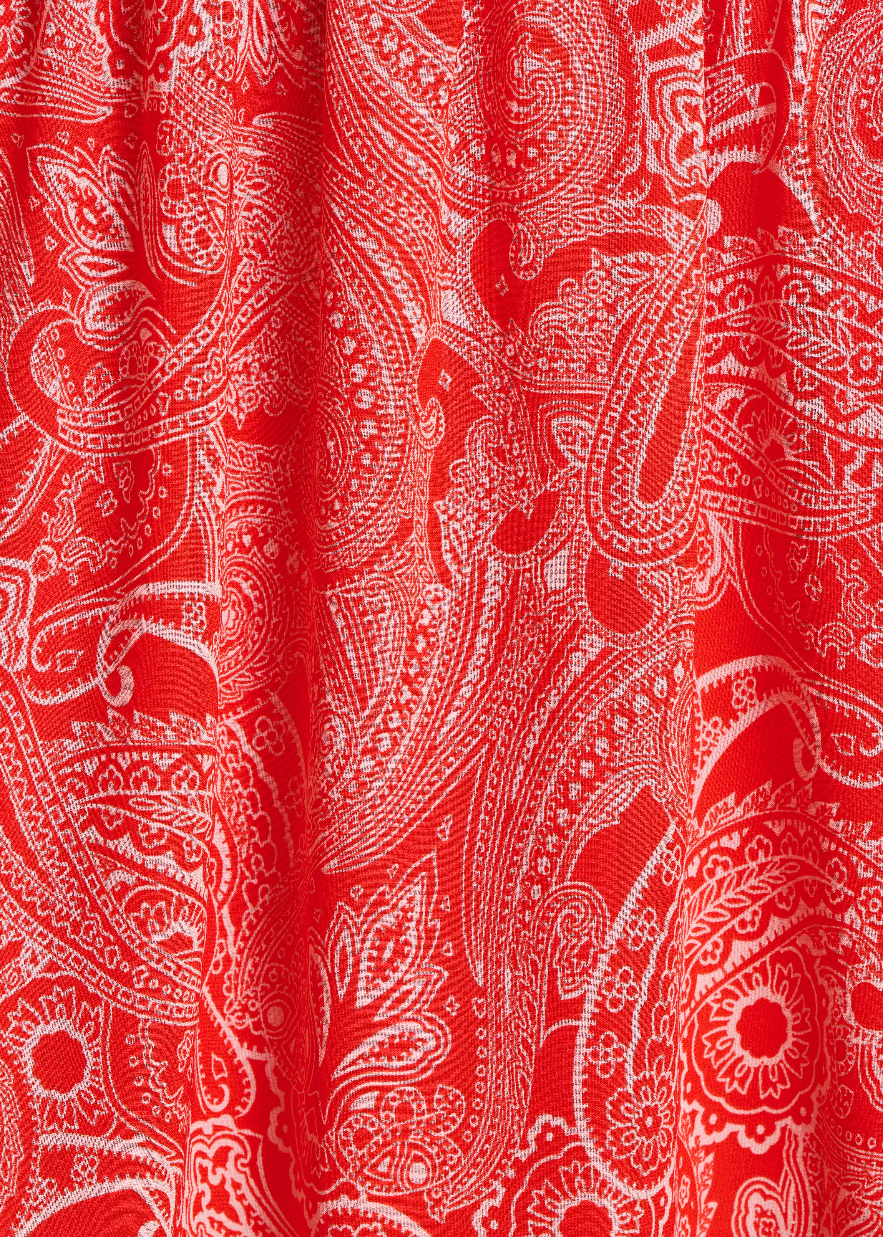 Long orange voile skirt with print and smocking