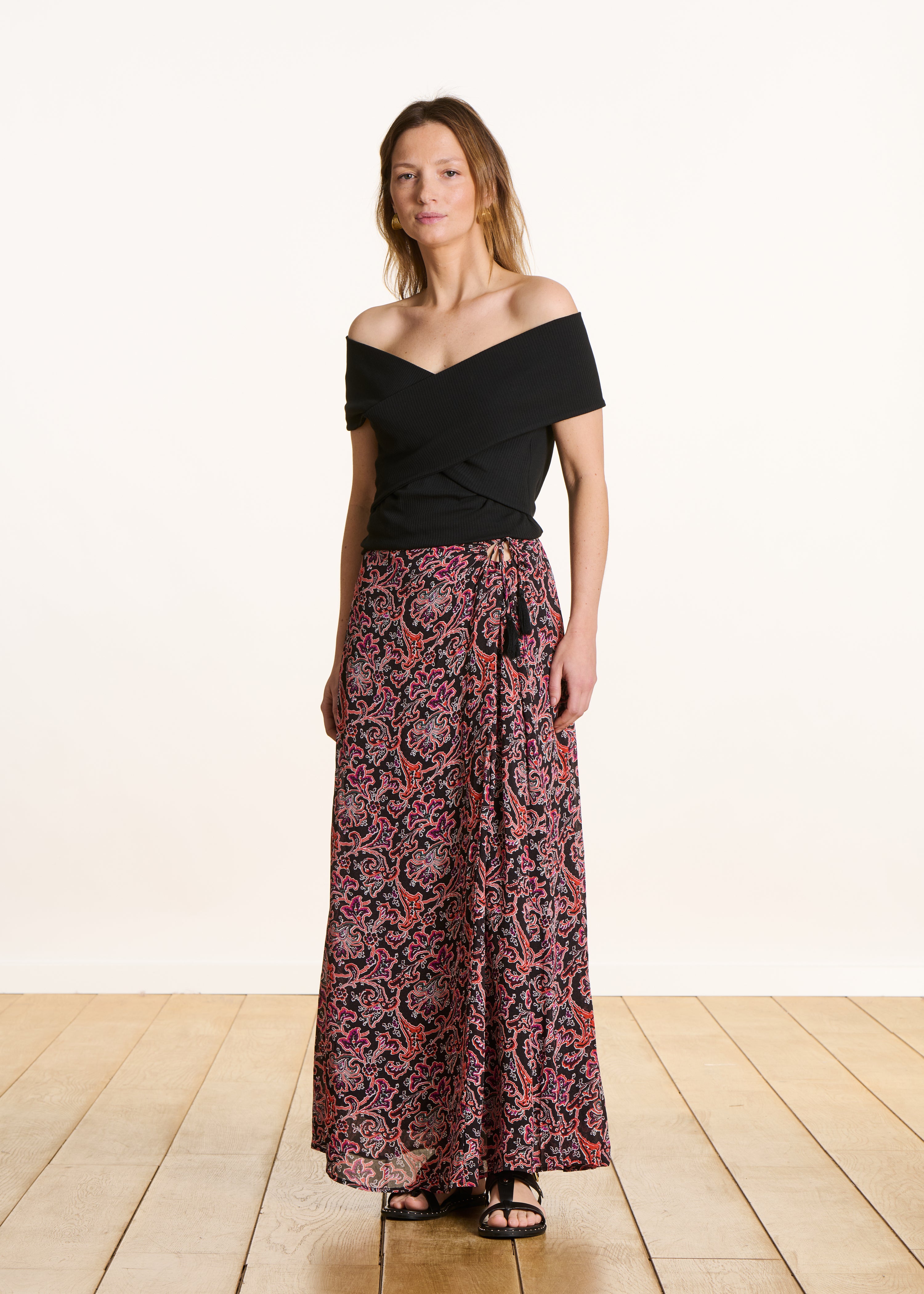 Black flared long skirt with floral print