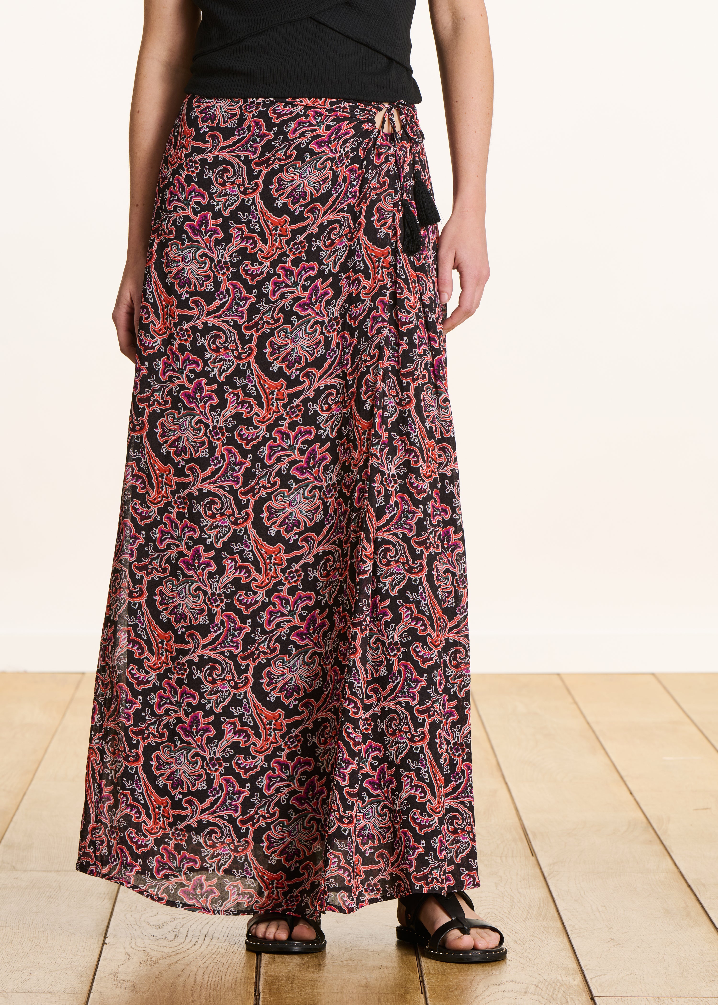 Black flared long skirt with floral print