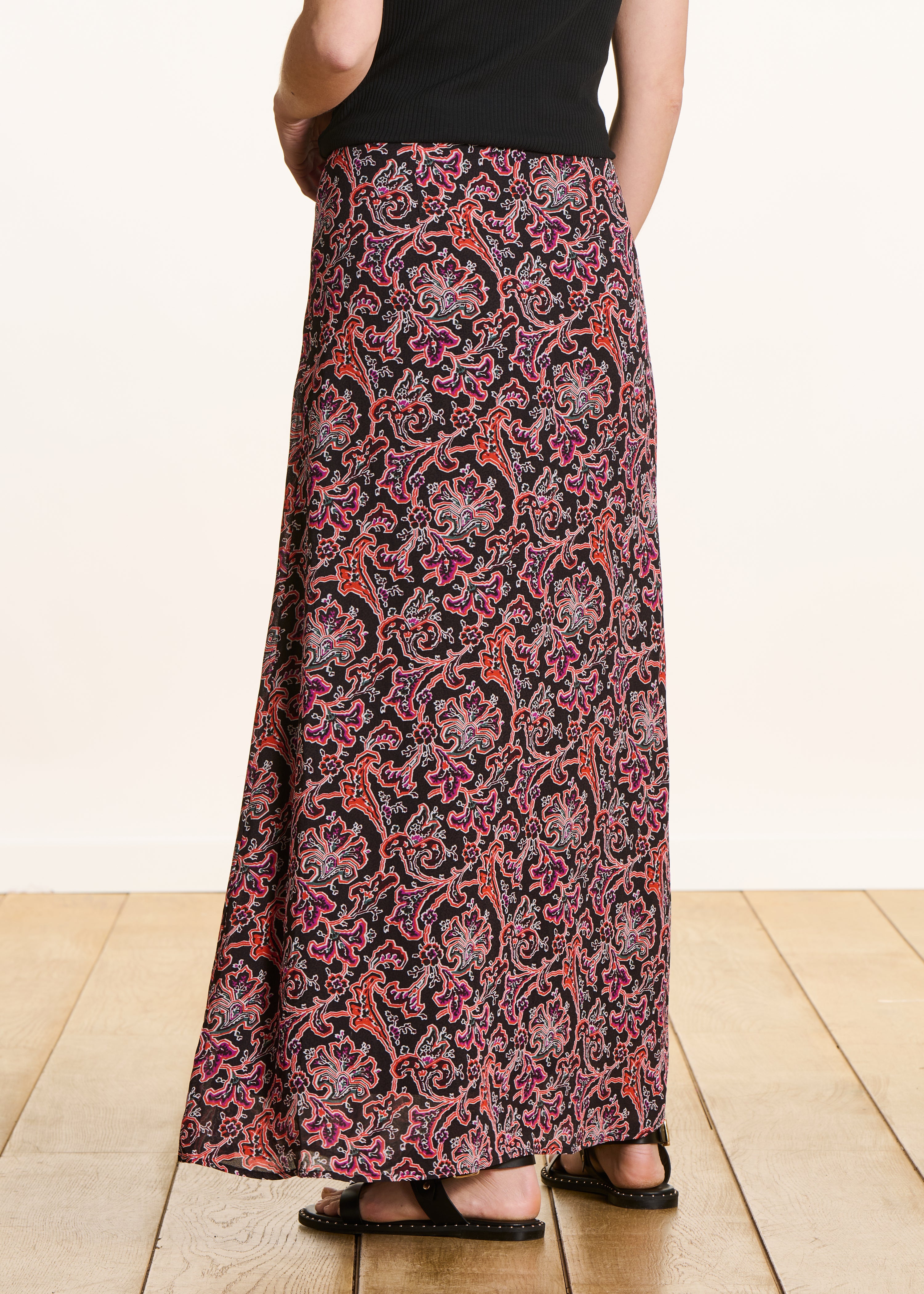 Black flared long skirt with floral print