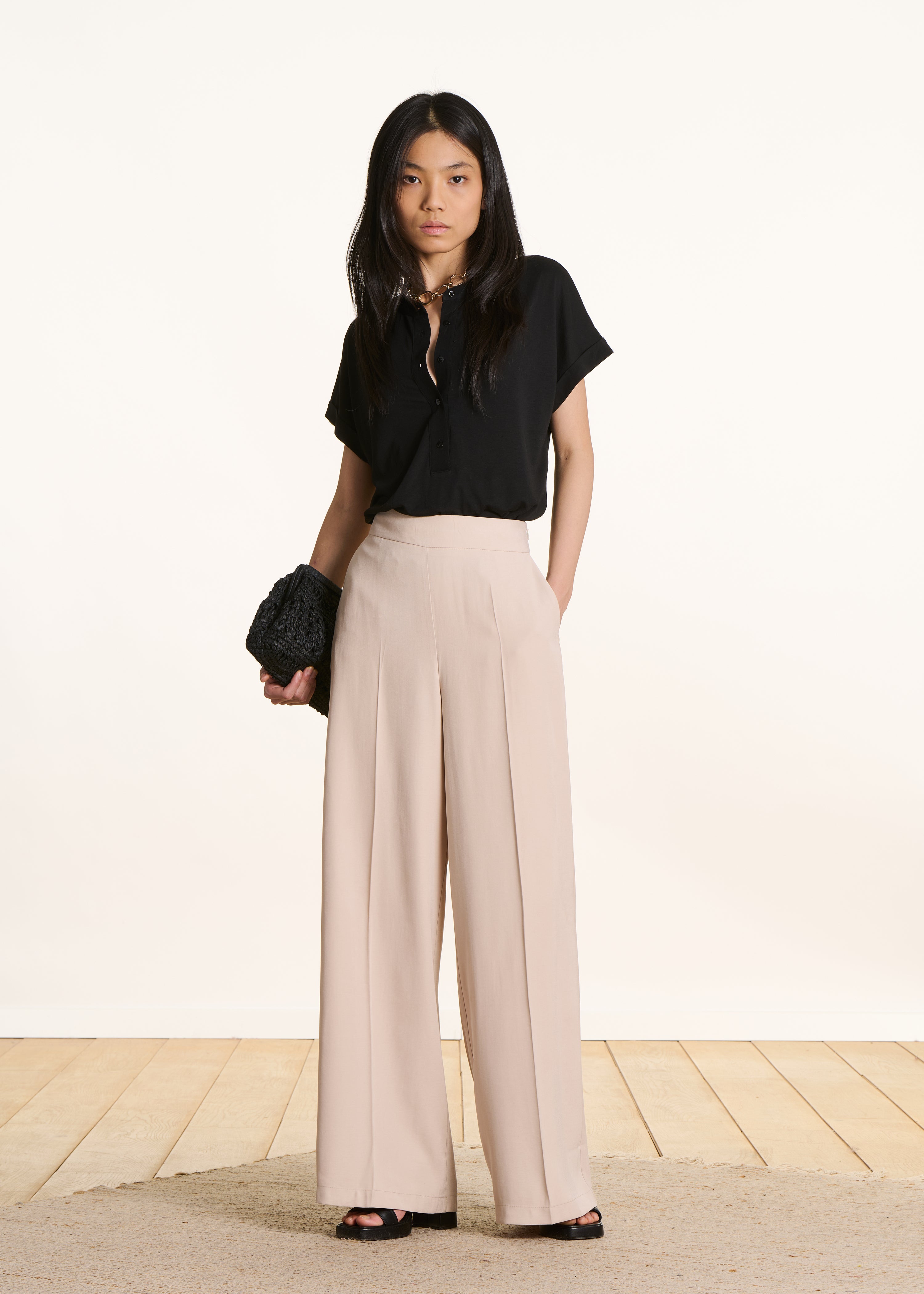 Pantaloni larghi beige a vita alta