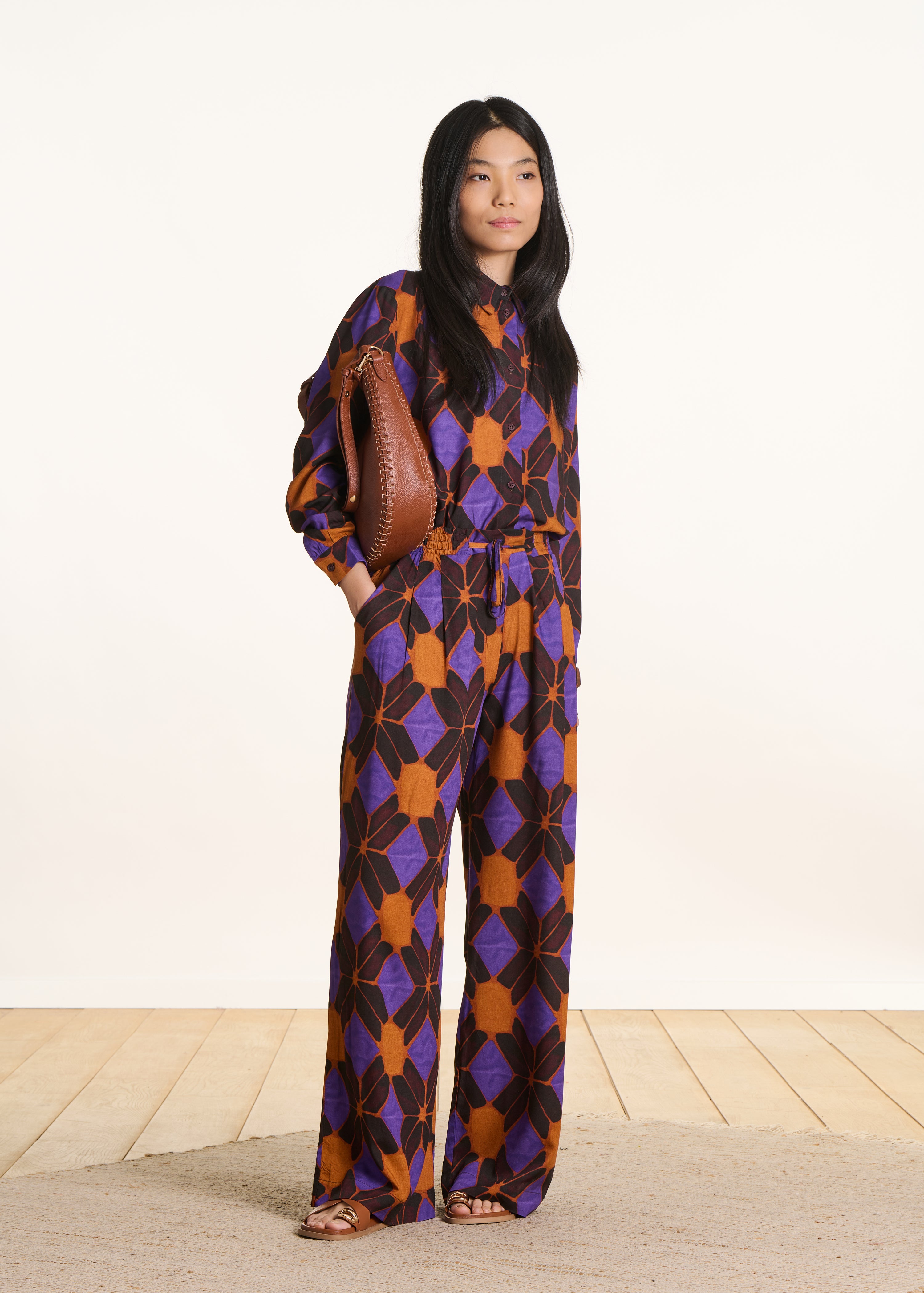 Wide orange and purple trousers with print