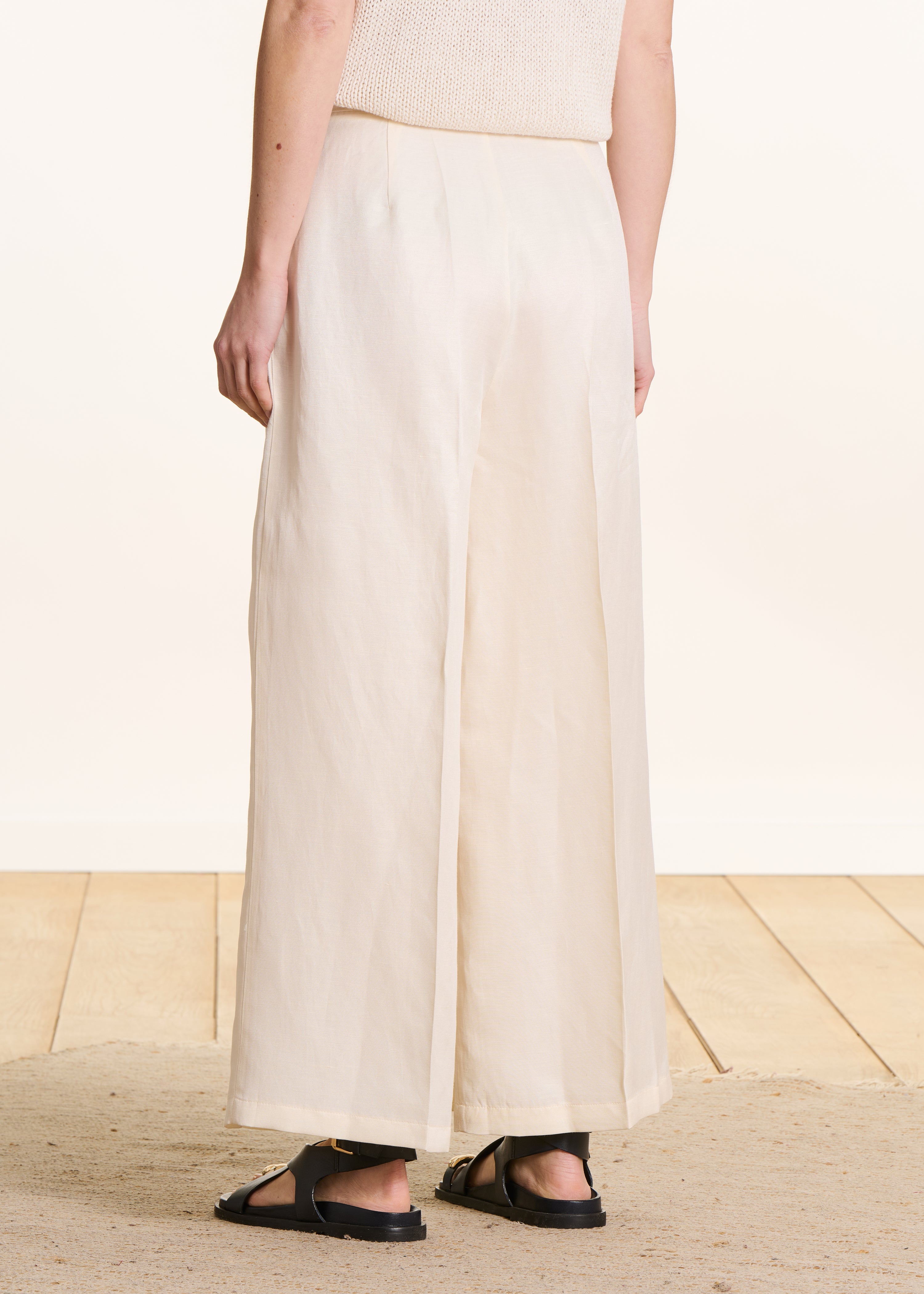 Pantaloni vita alta 7/8 écru con spacco