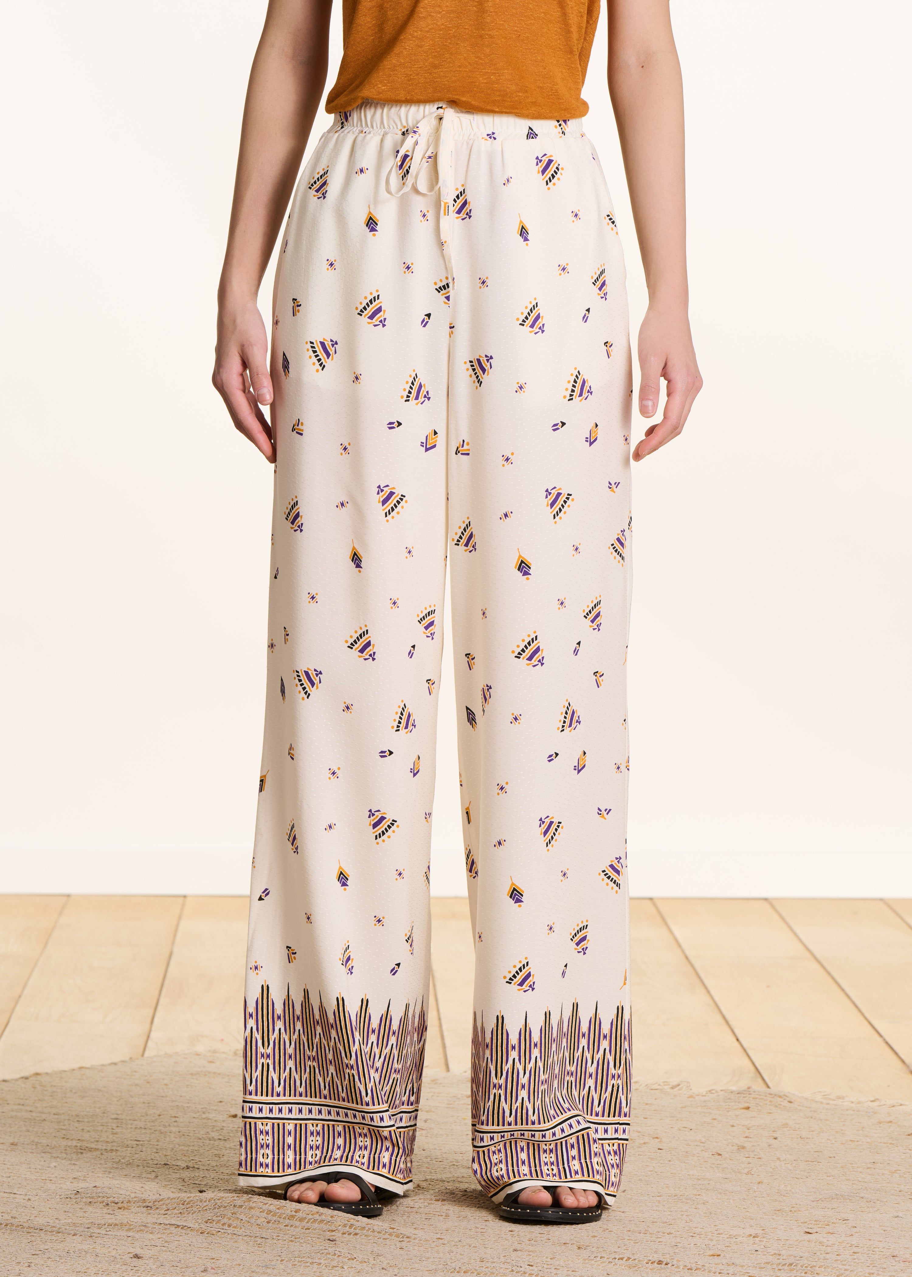 Wide cream pants with print