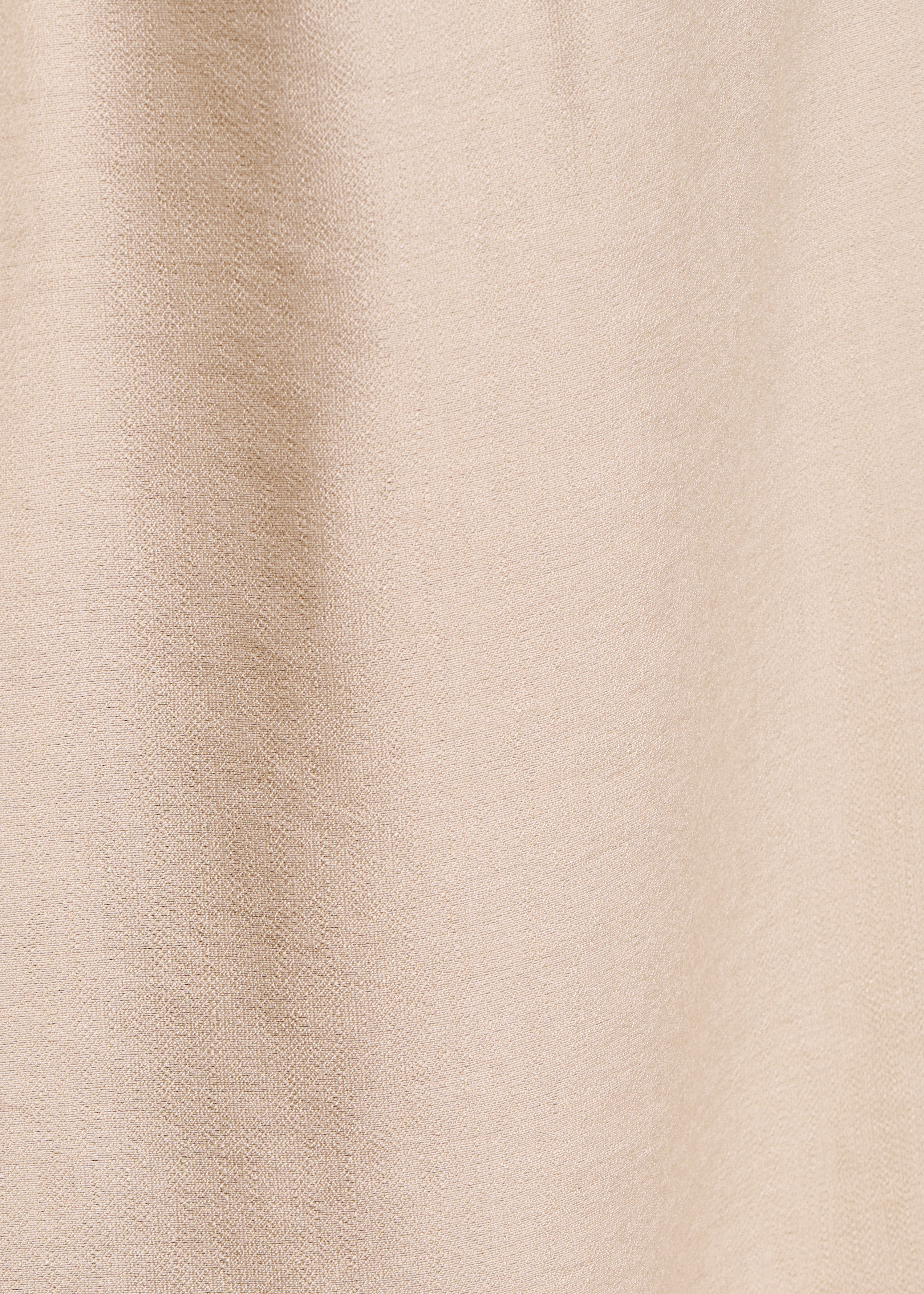 Pantaloni beige larghi a vita alta