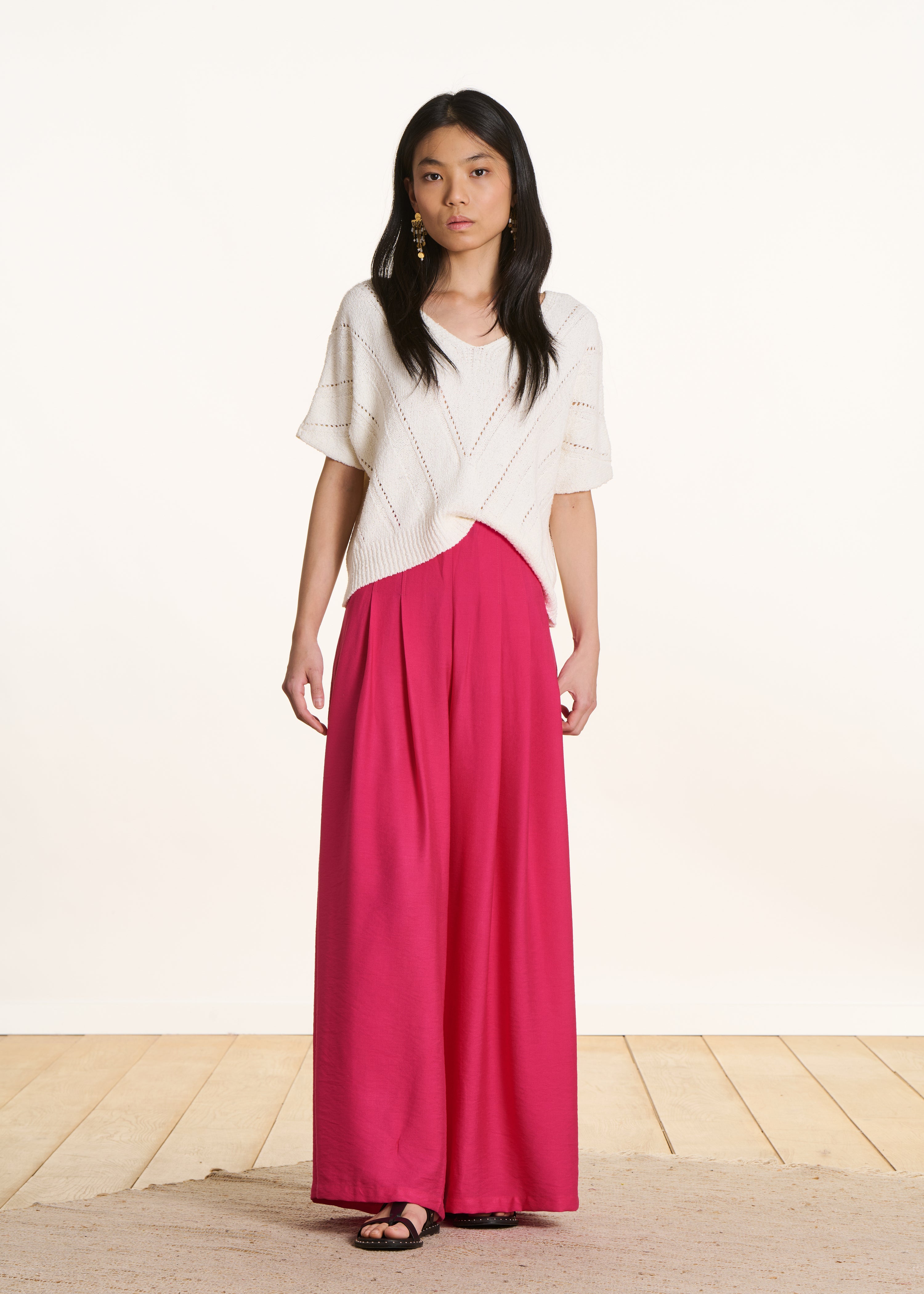 Wide high-waisted pink fuchsia pants with elastic waistband