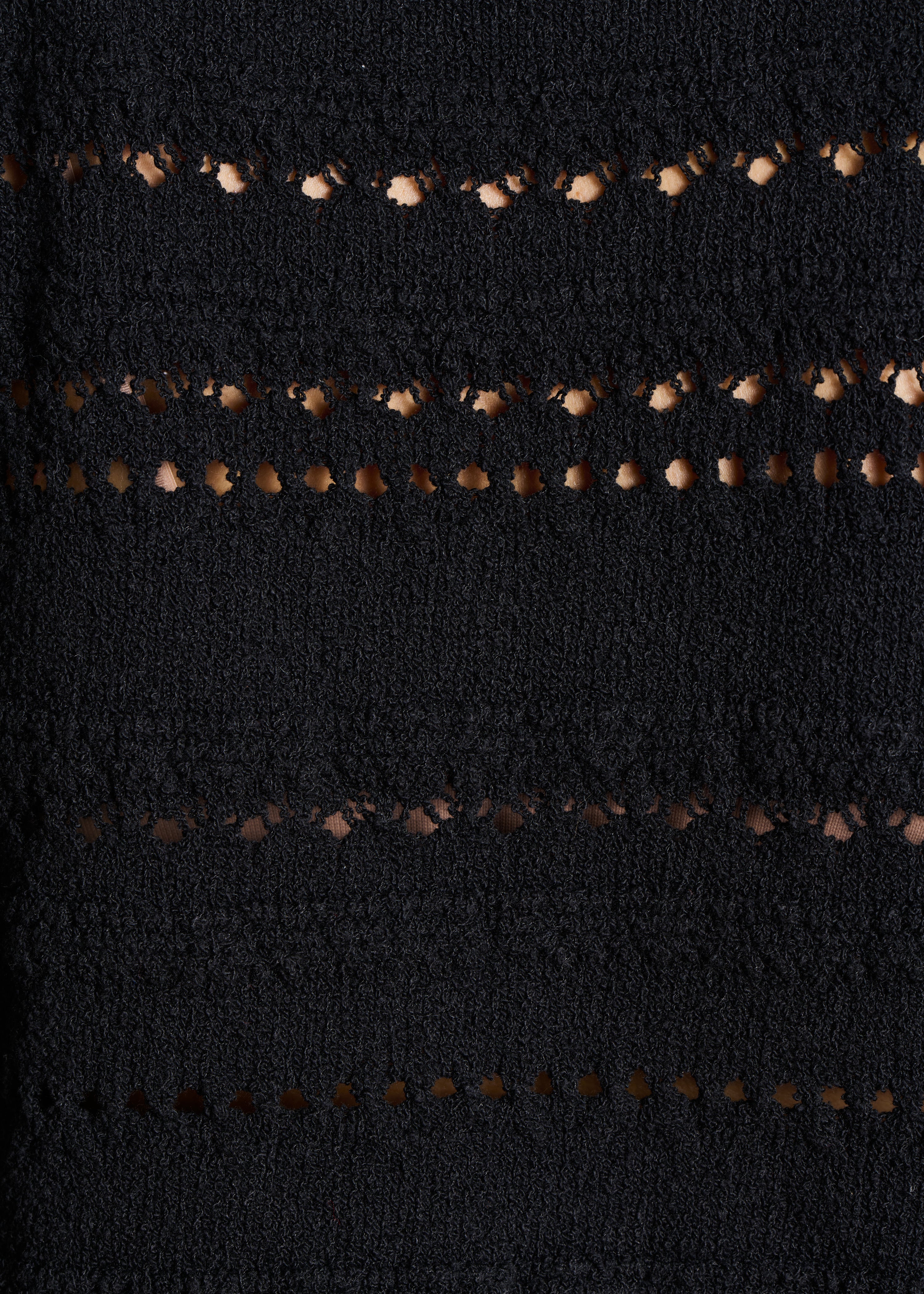 Pull noir en maille ajourée manches longues