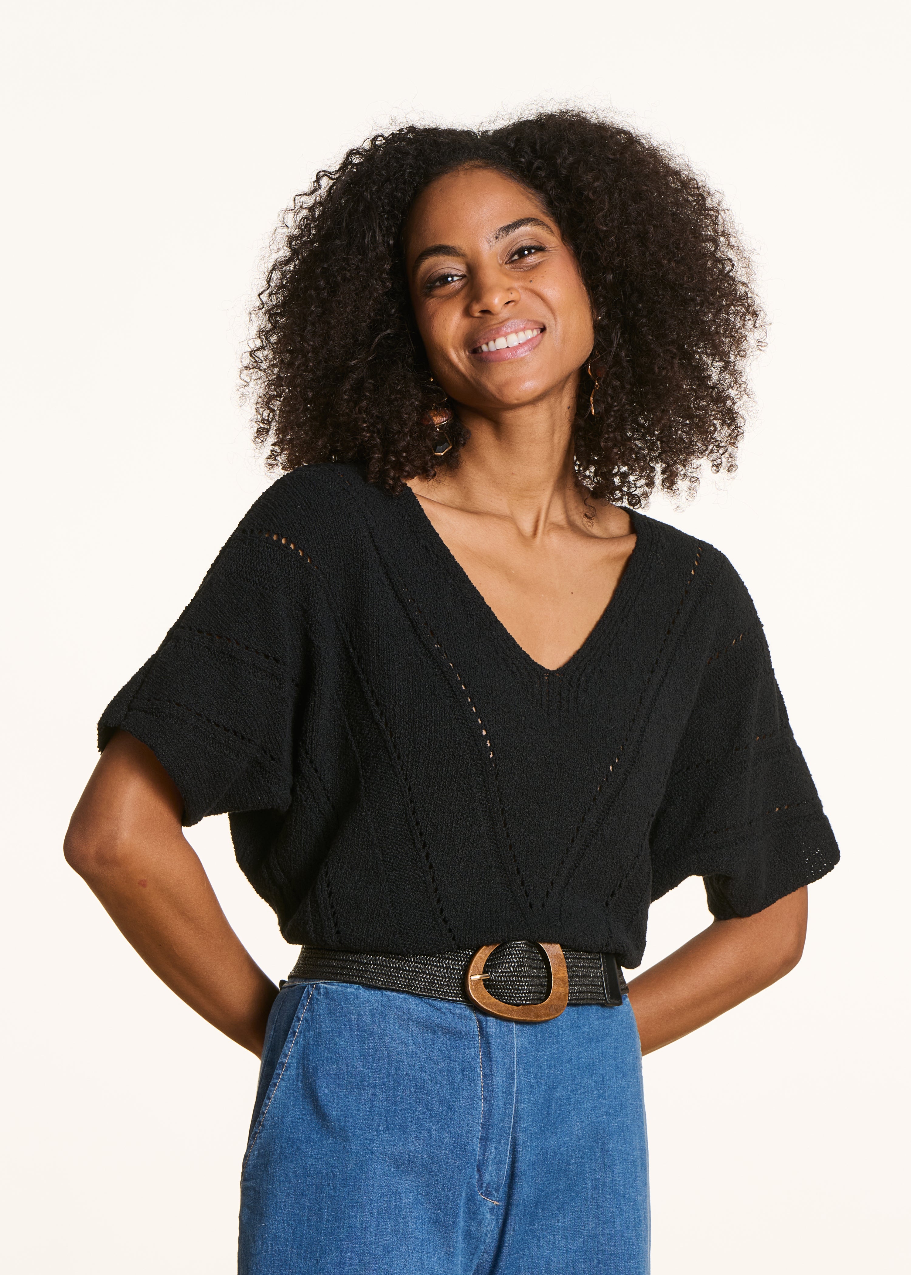 Loose black sweater in openwork knit with short sleeves - La Fée Maraboutée