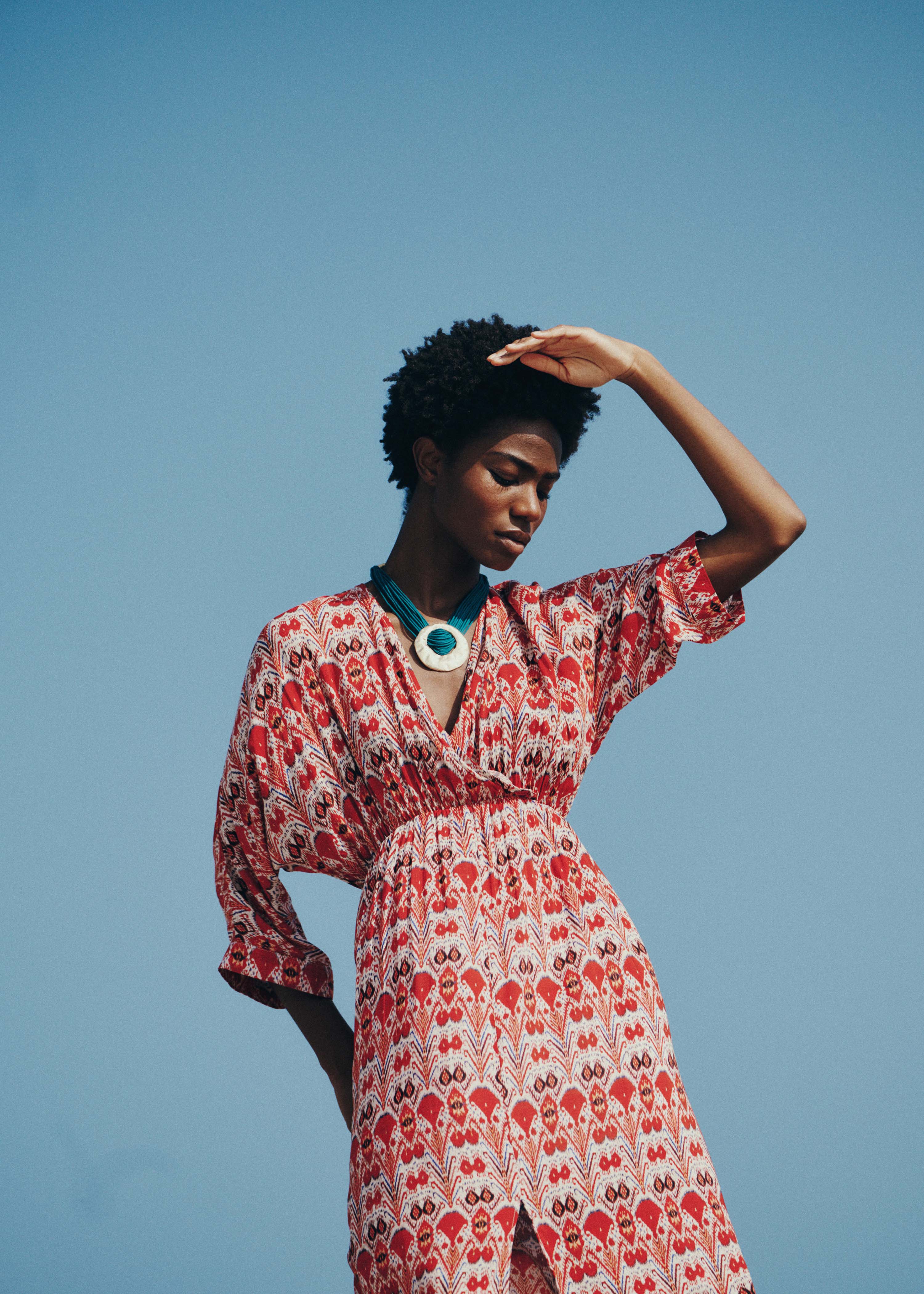 Long wrap dress with red print