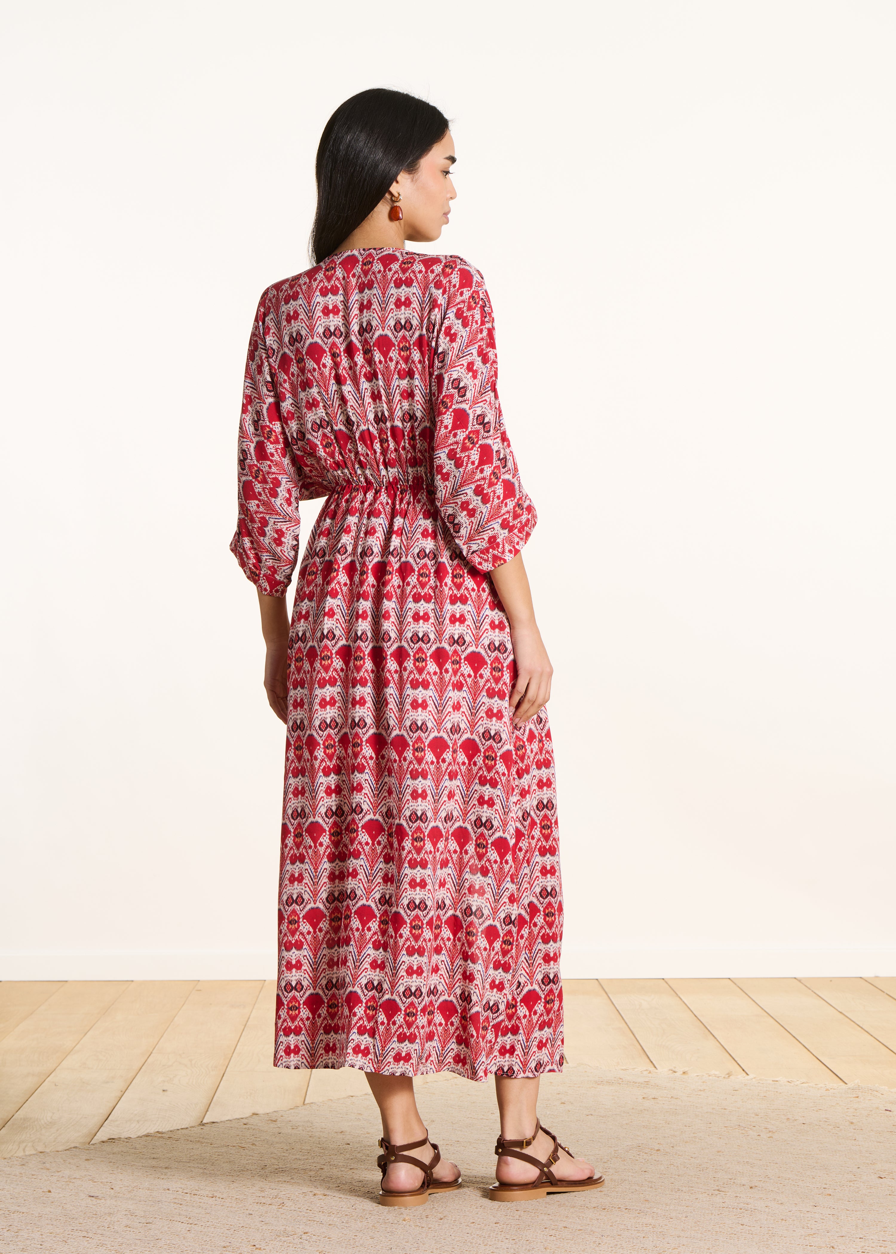 Long wrap dress with red print