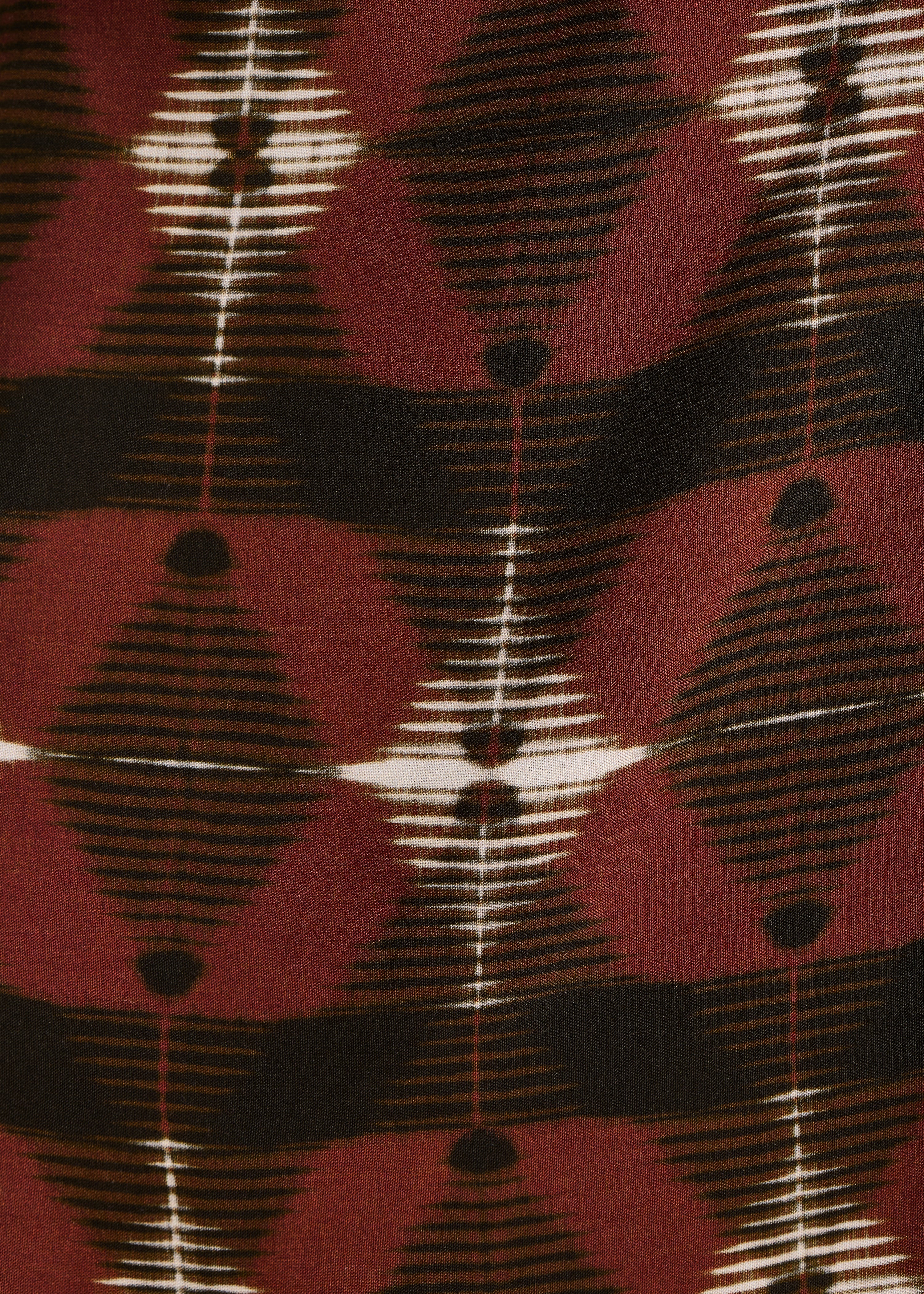 Lange wikkeljurk in bruin met print