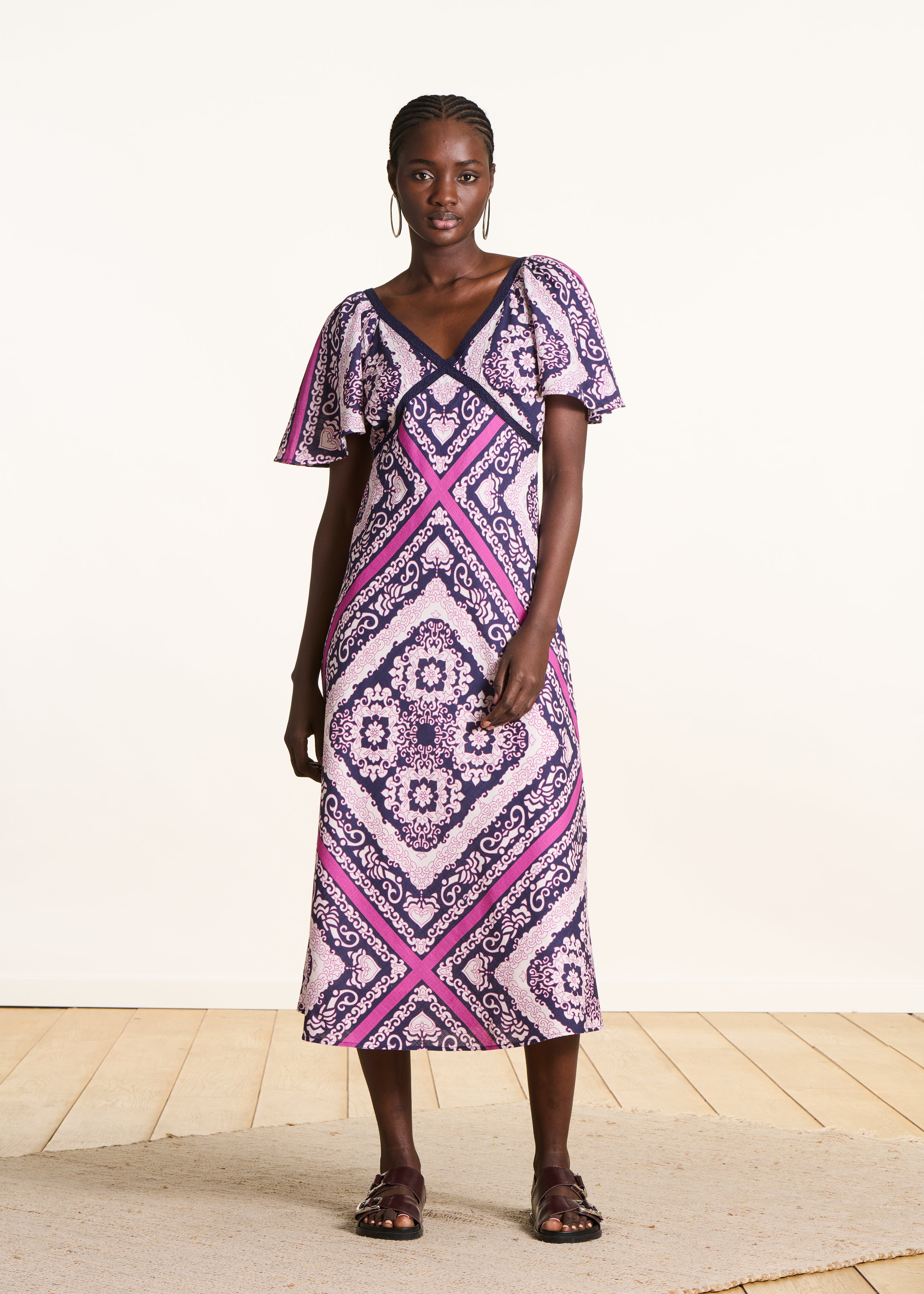 Long purple and pink dress with scarf print