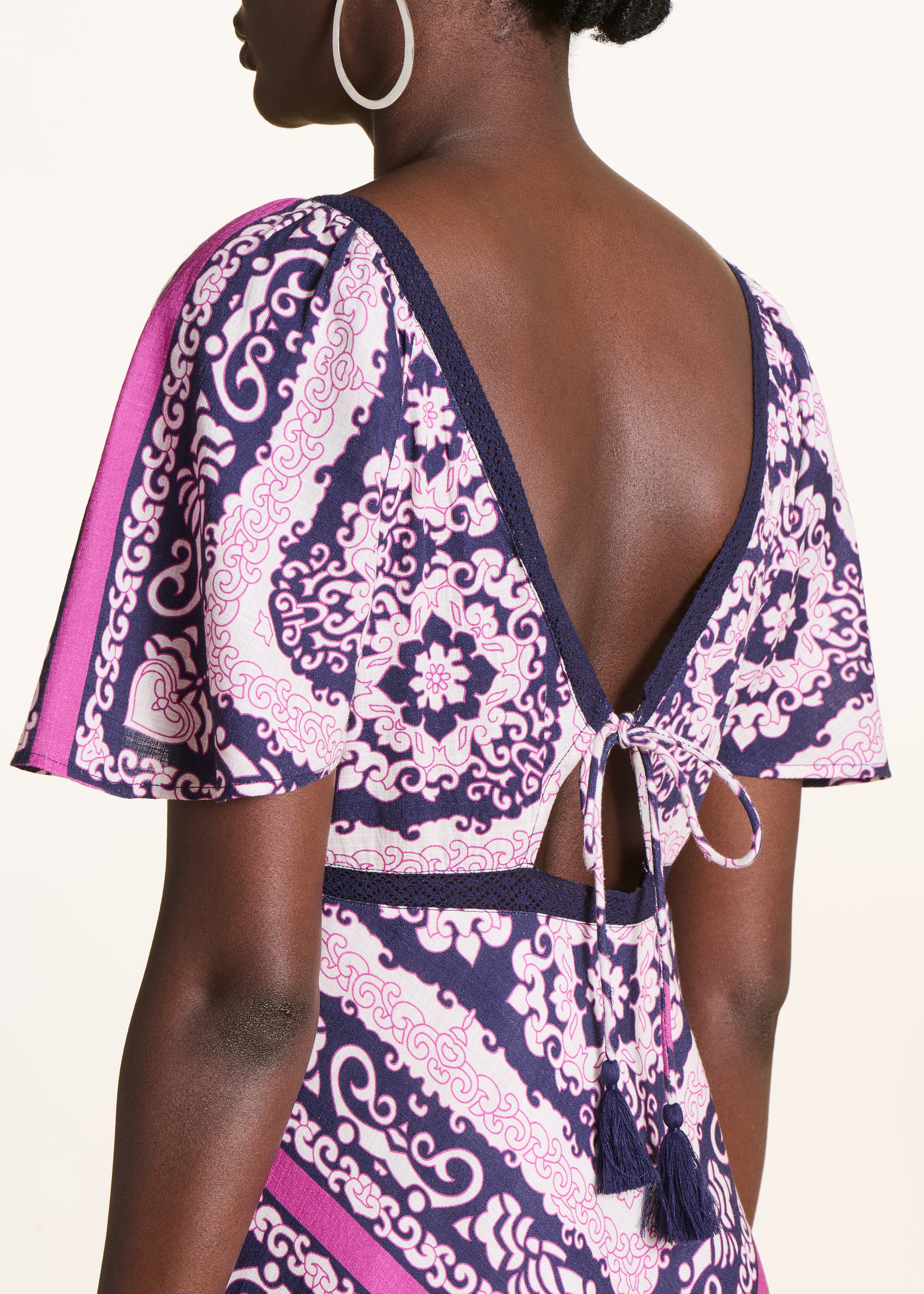 Long purple and pink dress with scarf print