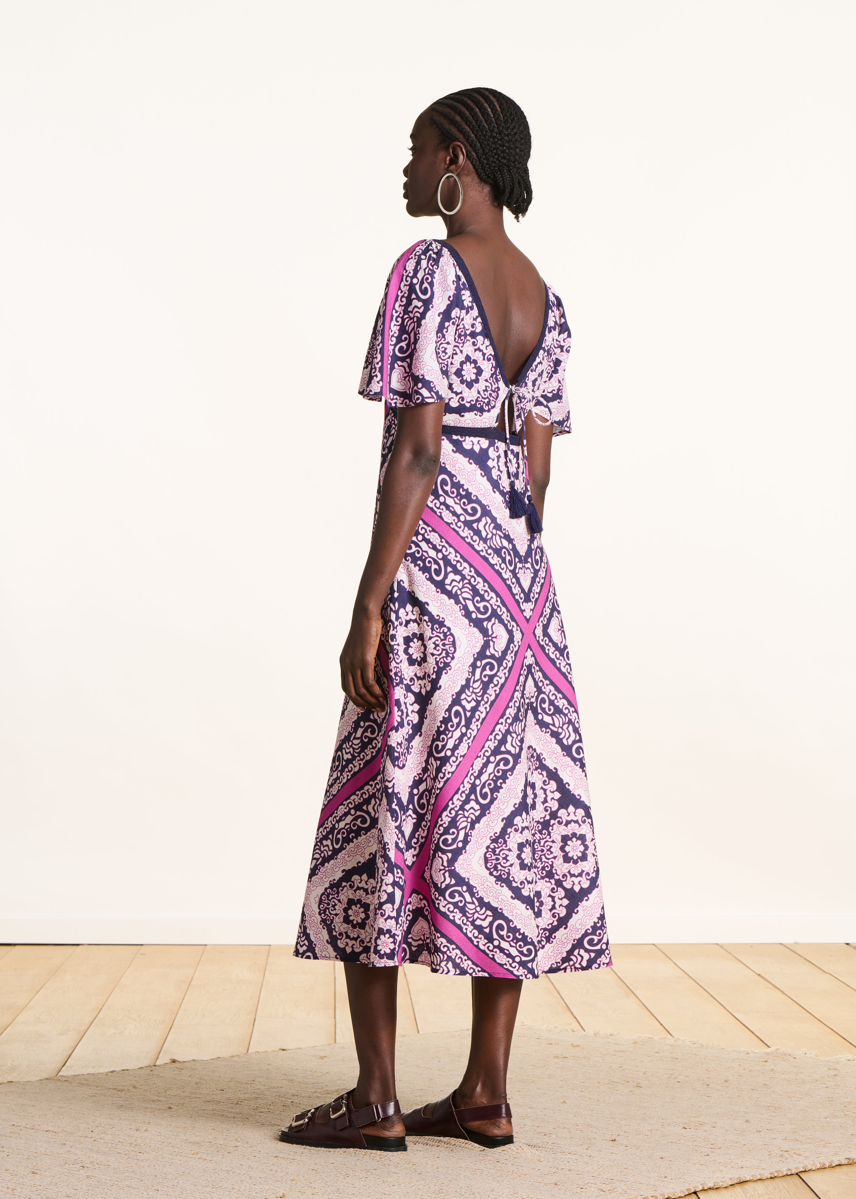 Long purple and pink dress with scarf print