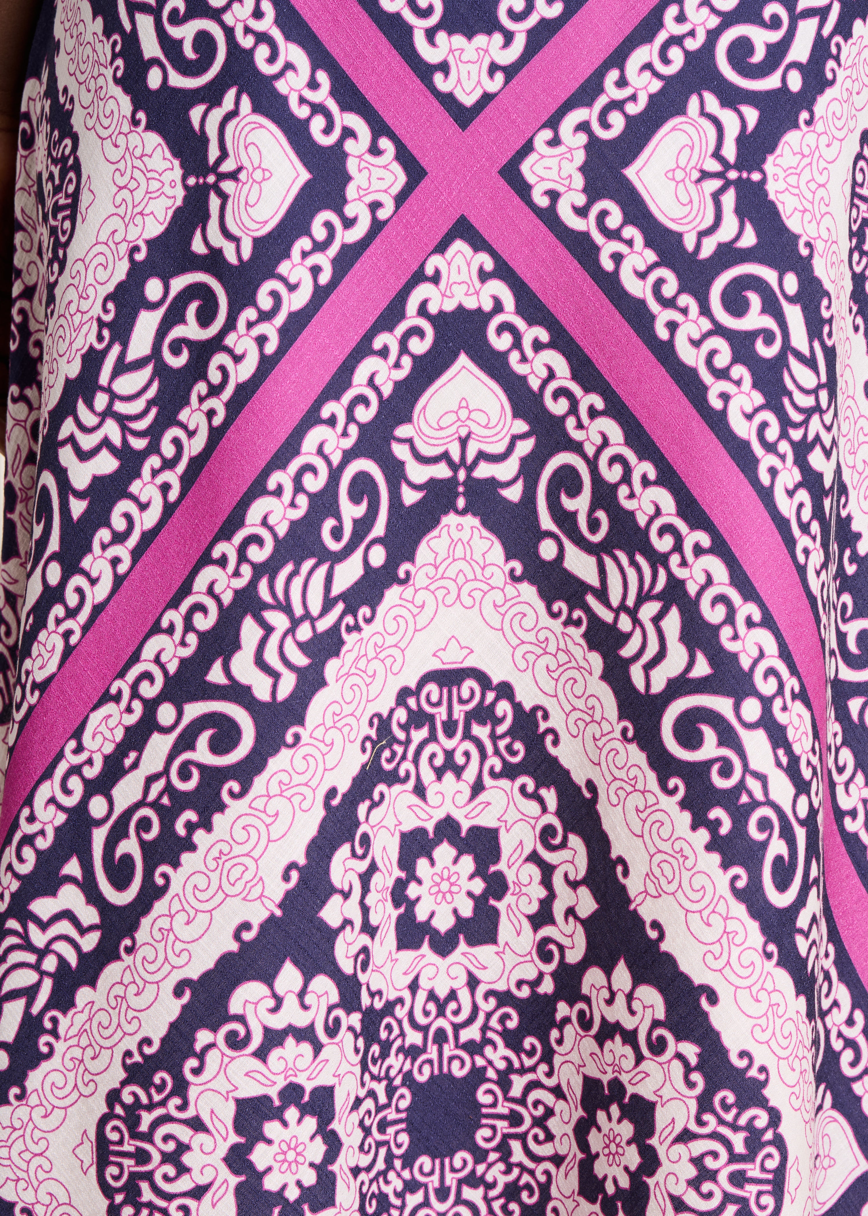 Long purple and pink dress with scarf print