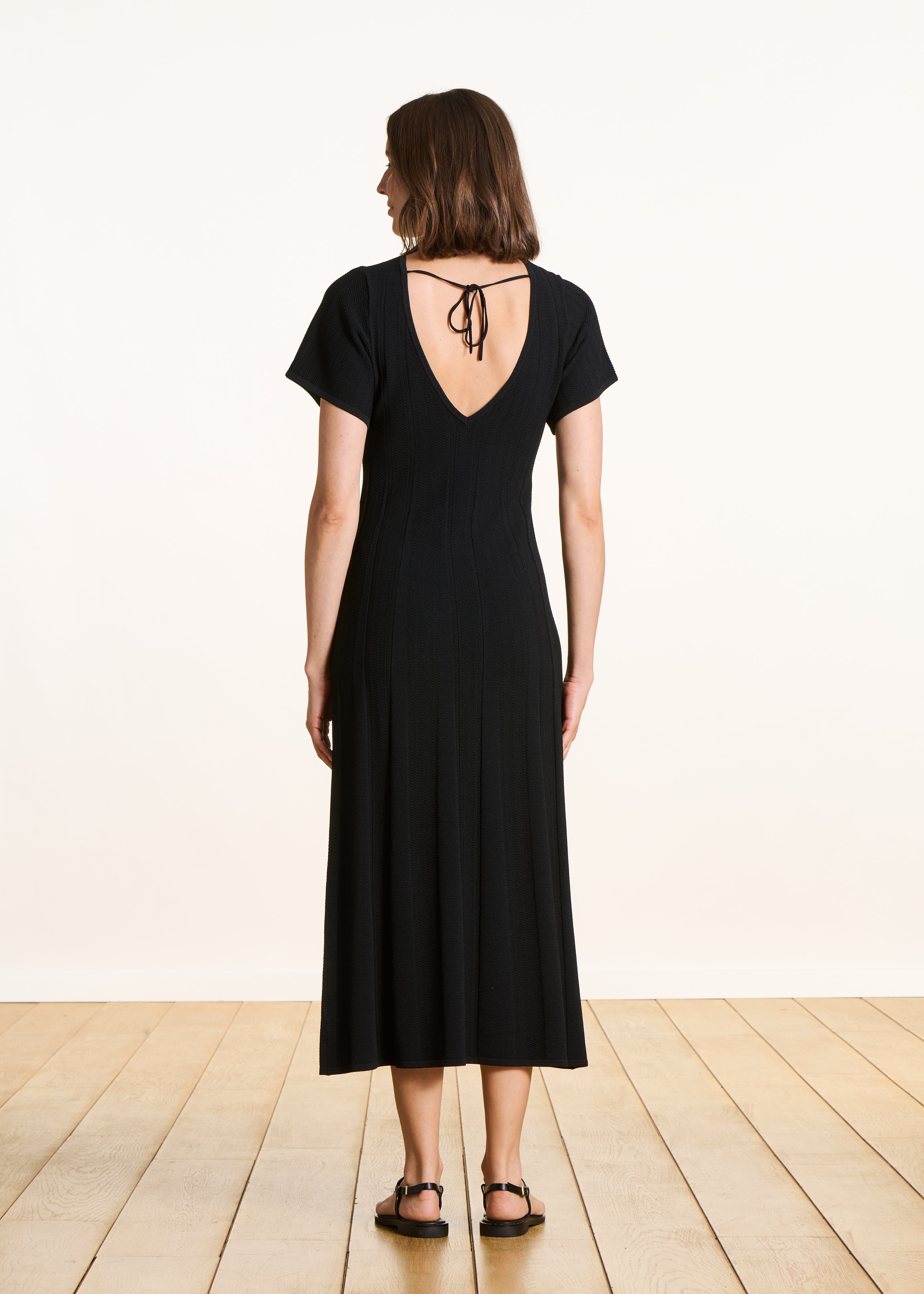 Black long knit dress with short sleeves