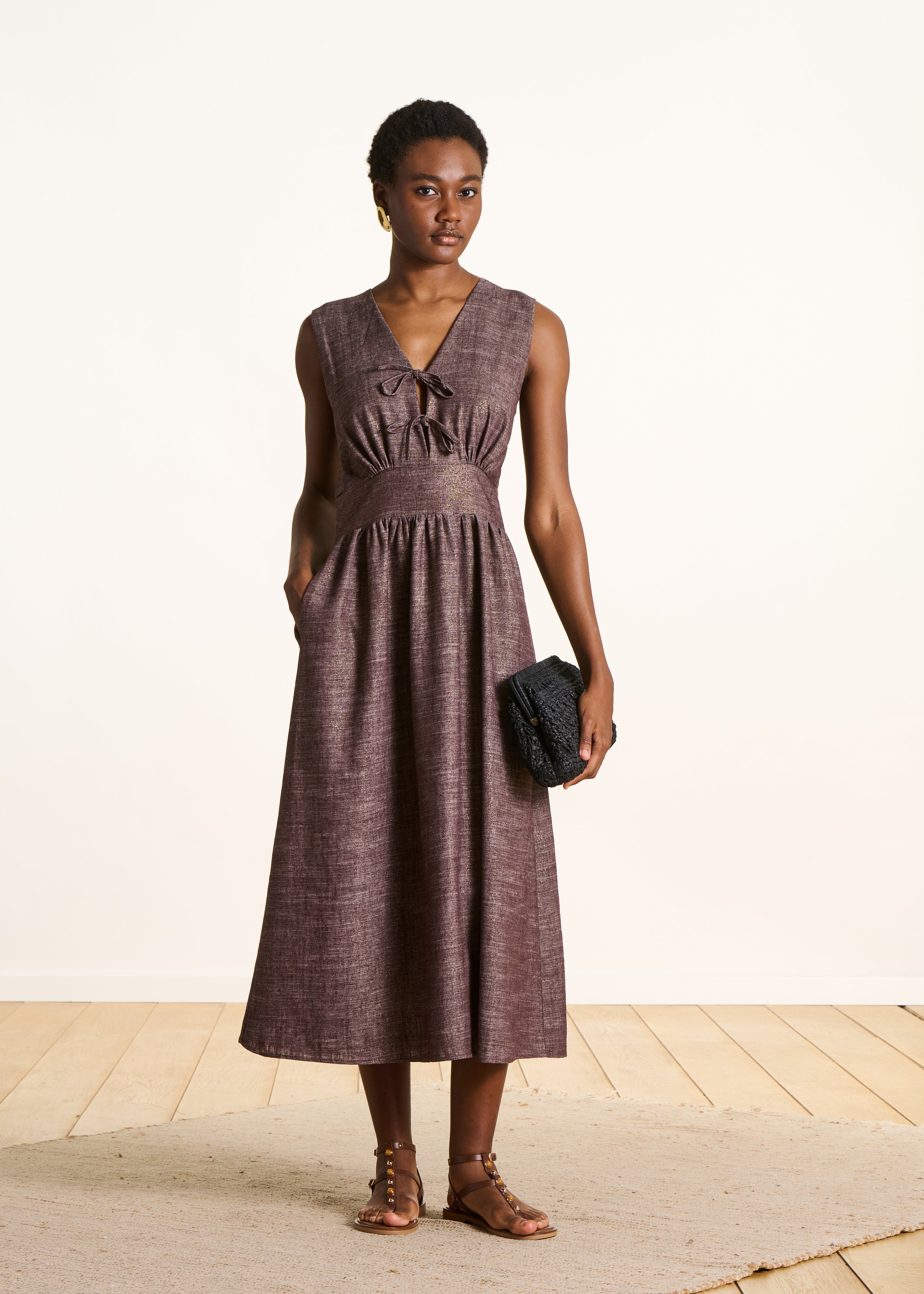 Long brown shimmering sleeveless dress