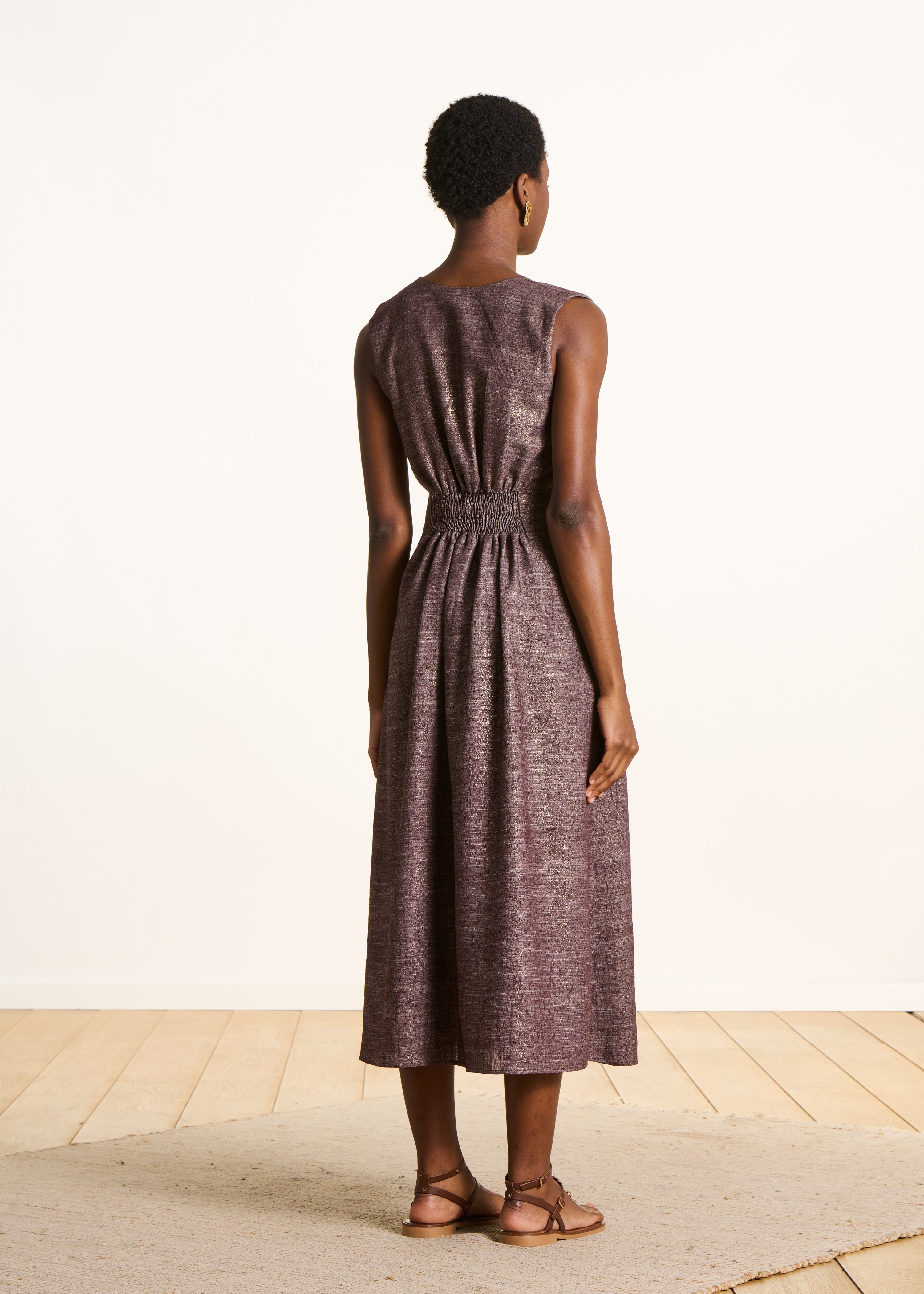 Long brown shimmering sleeveless dress
