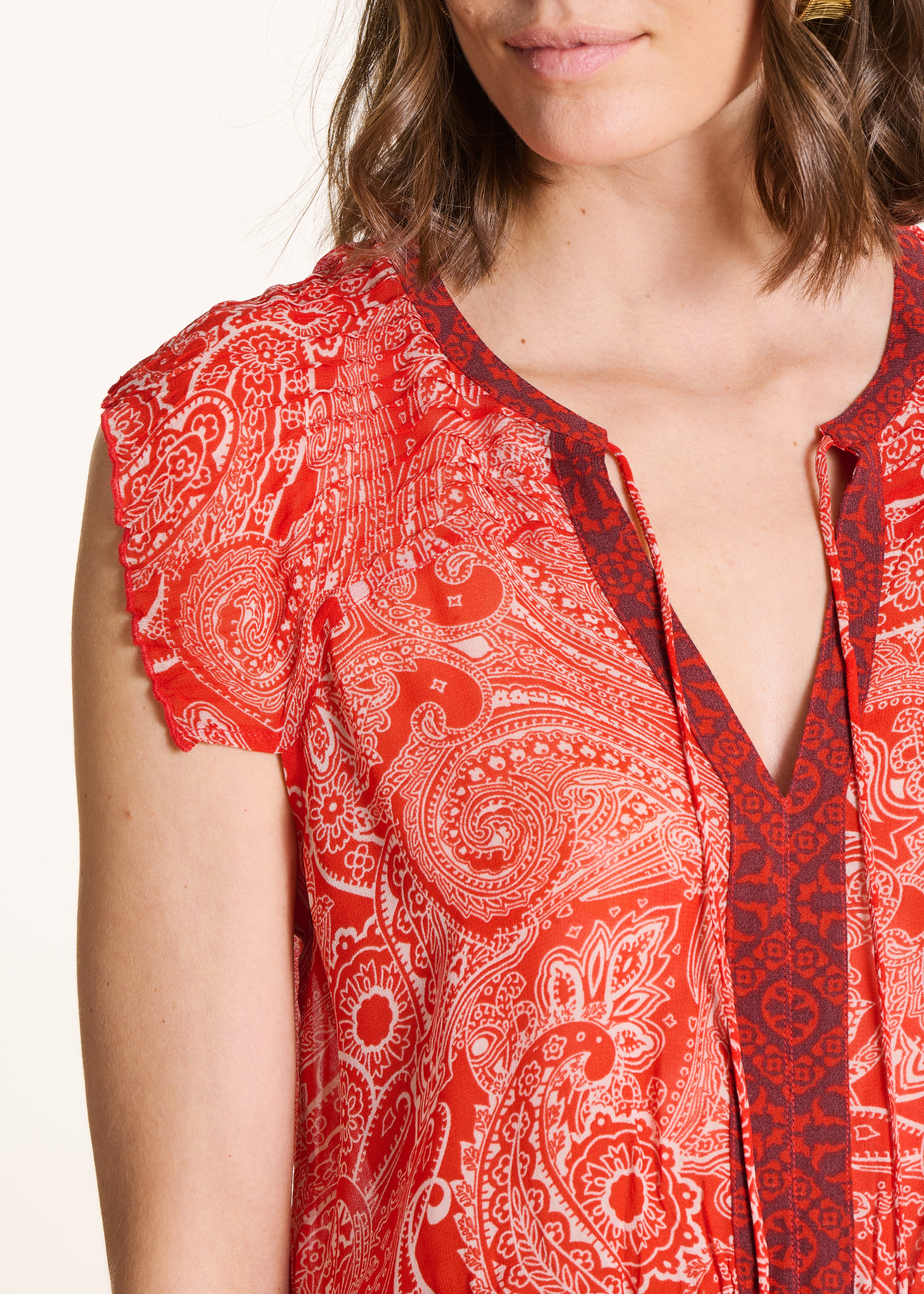Vestido corto fluido naranja con estampado