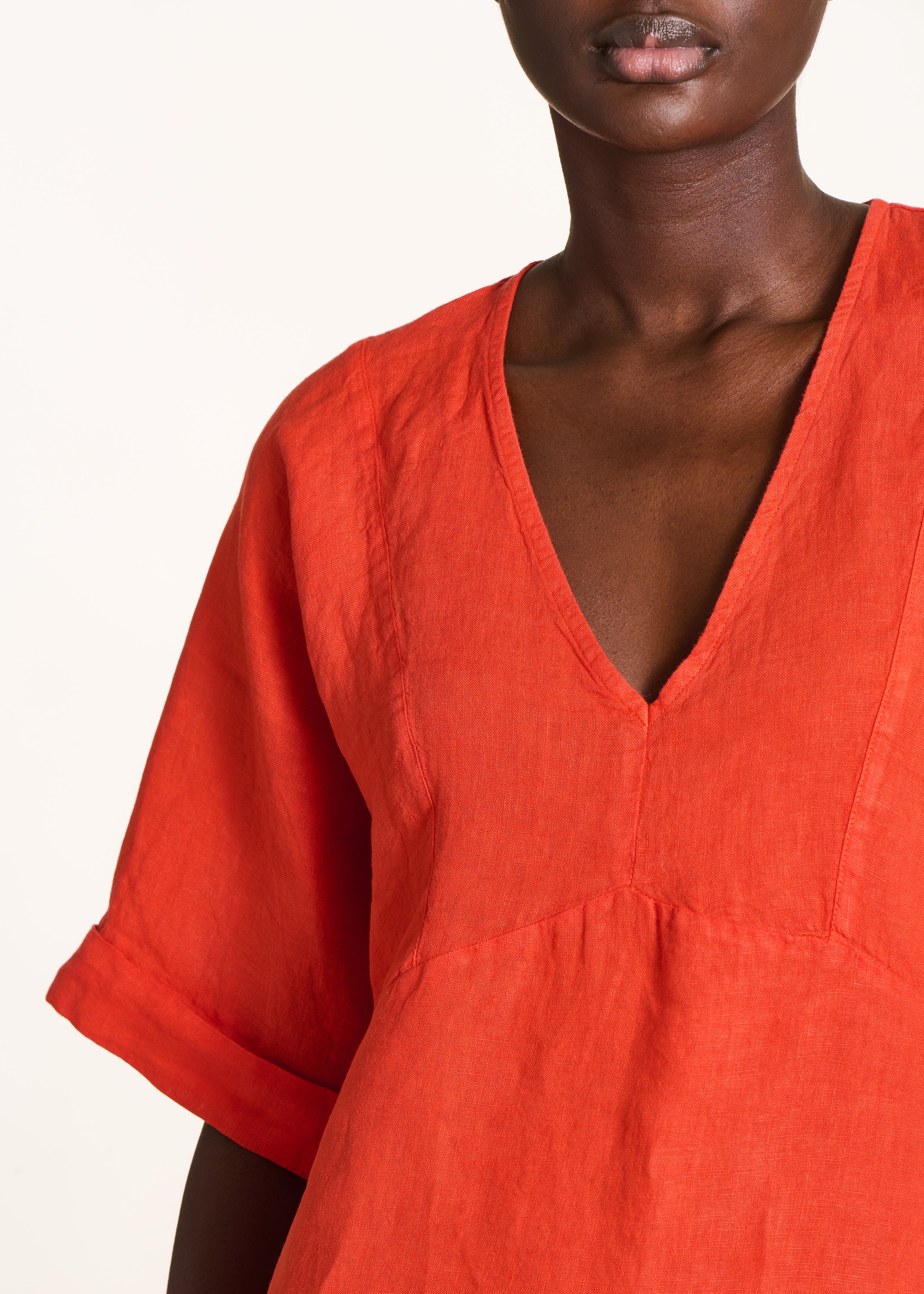 Loose short orange linen dress with V-neck
