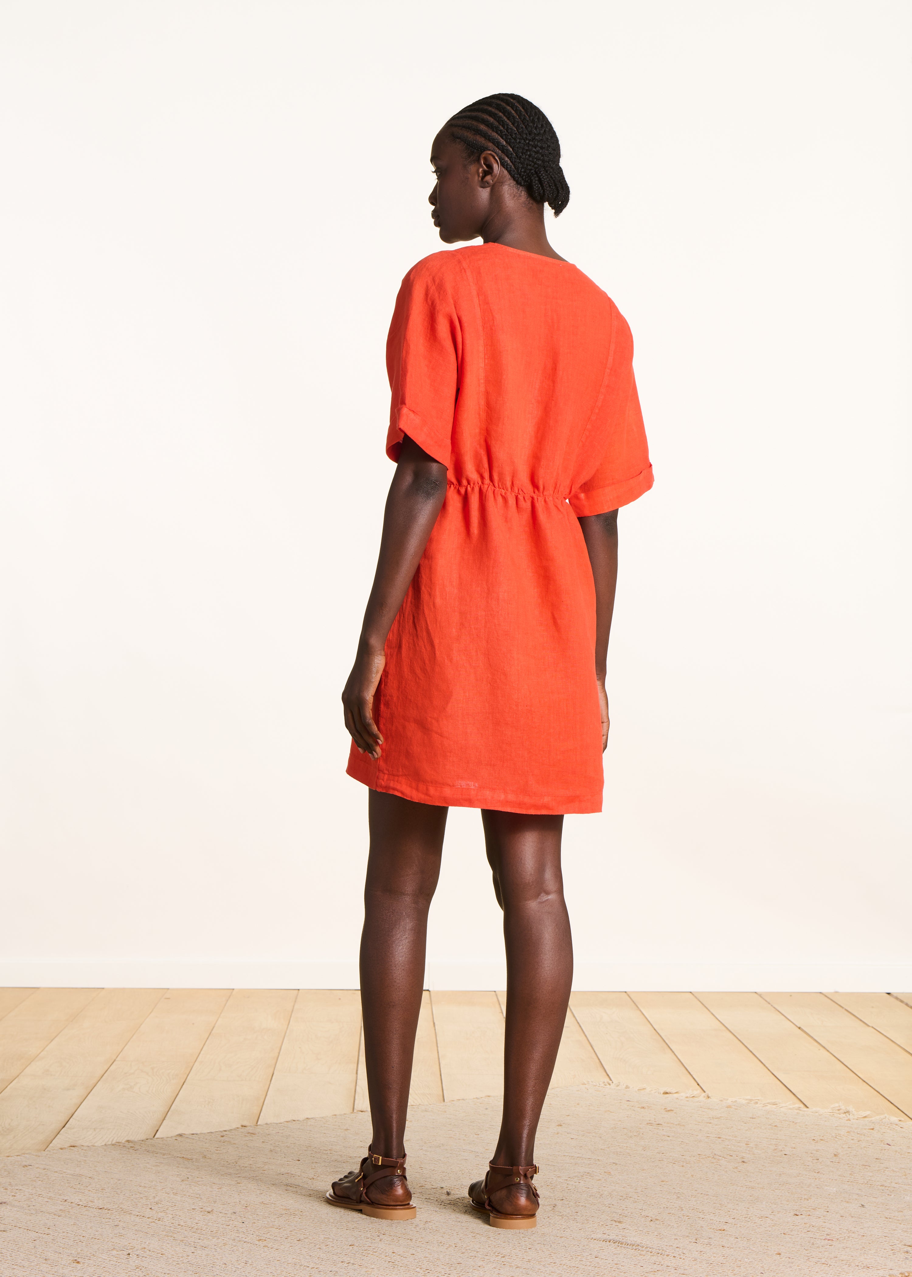 Loose short orange linen dress with V-neck