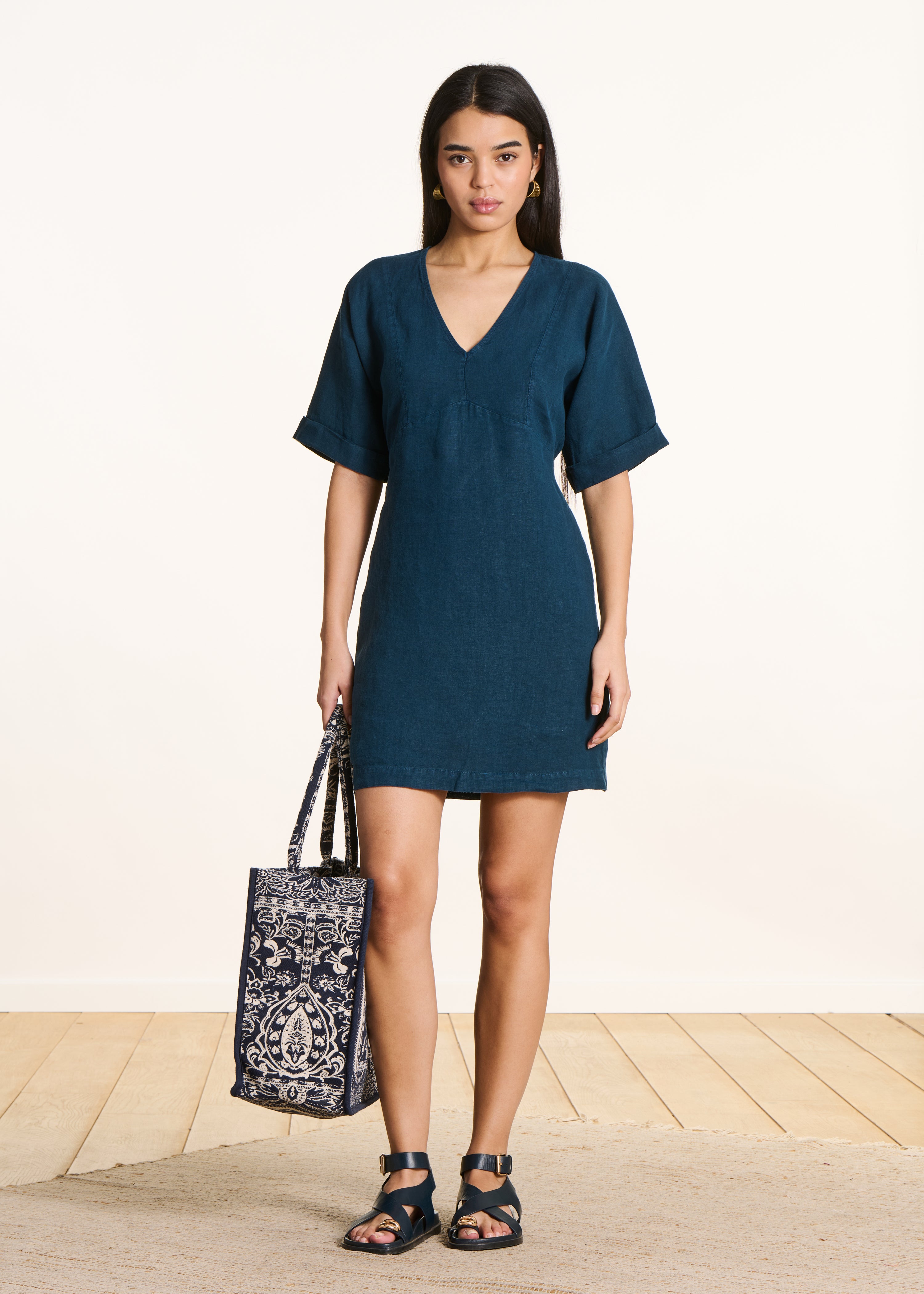 loose short dress Loose short dress in petrol blue linen with V-neck