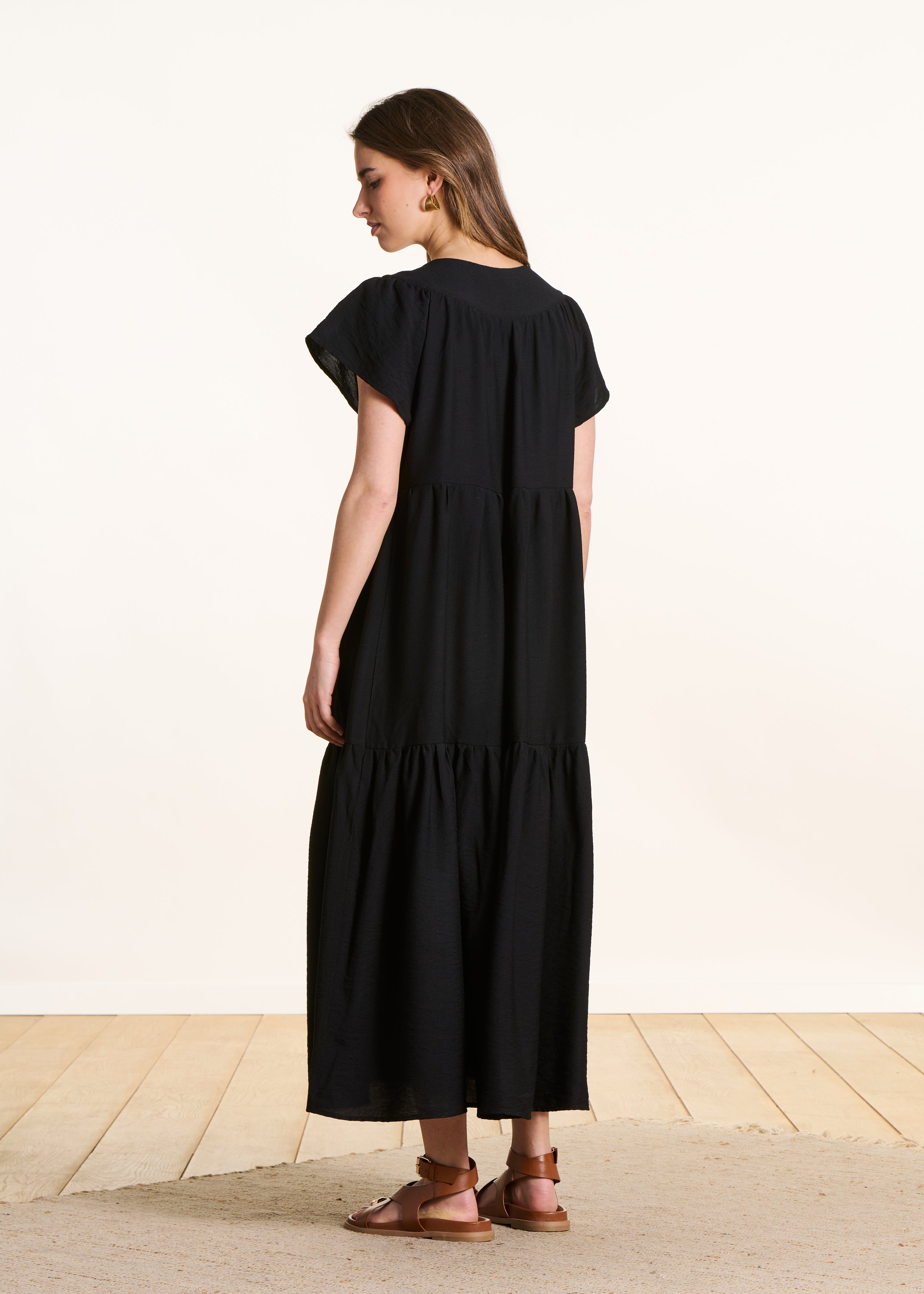 Long black jacquard dress with short sleeves