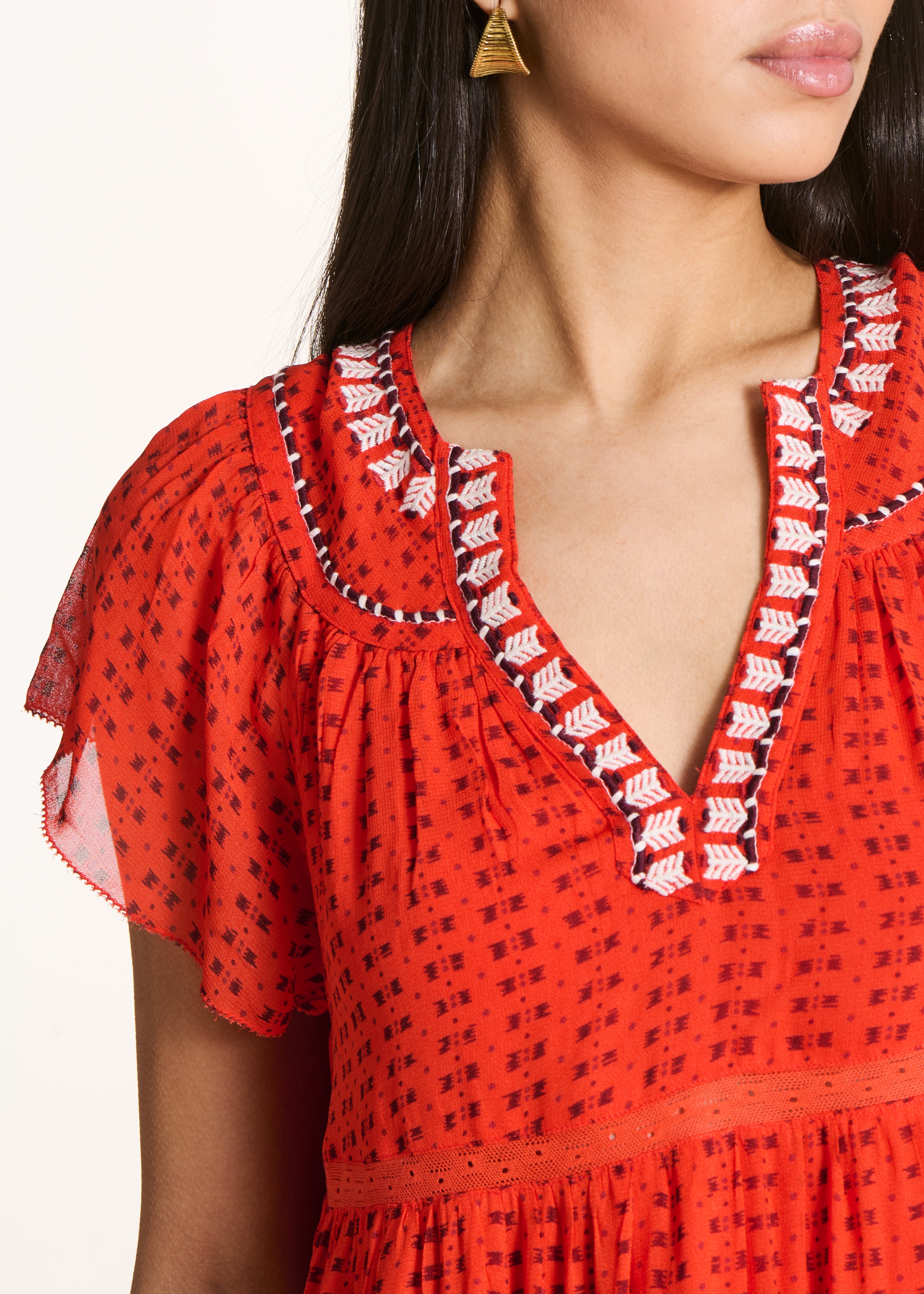 Long orange printed dress with ruffles
