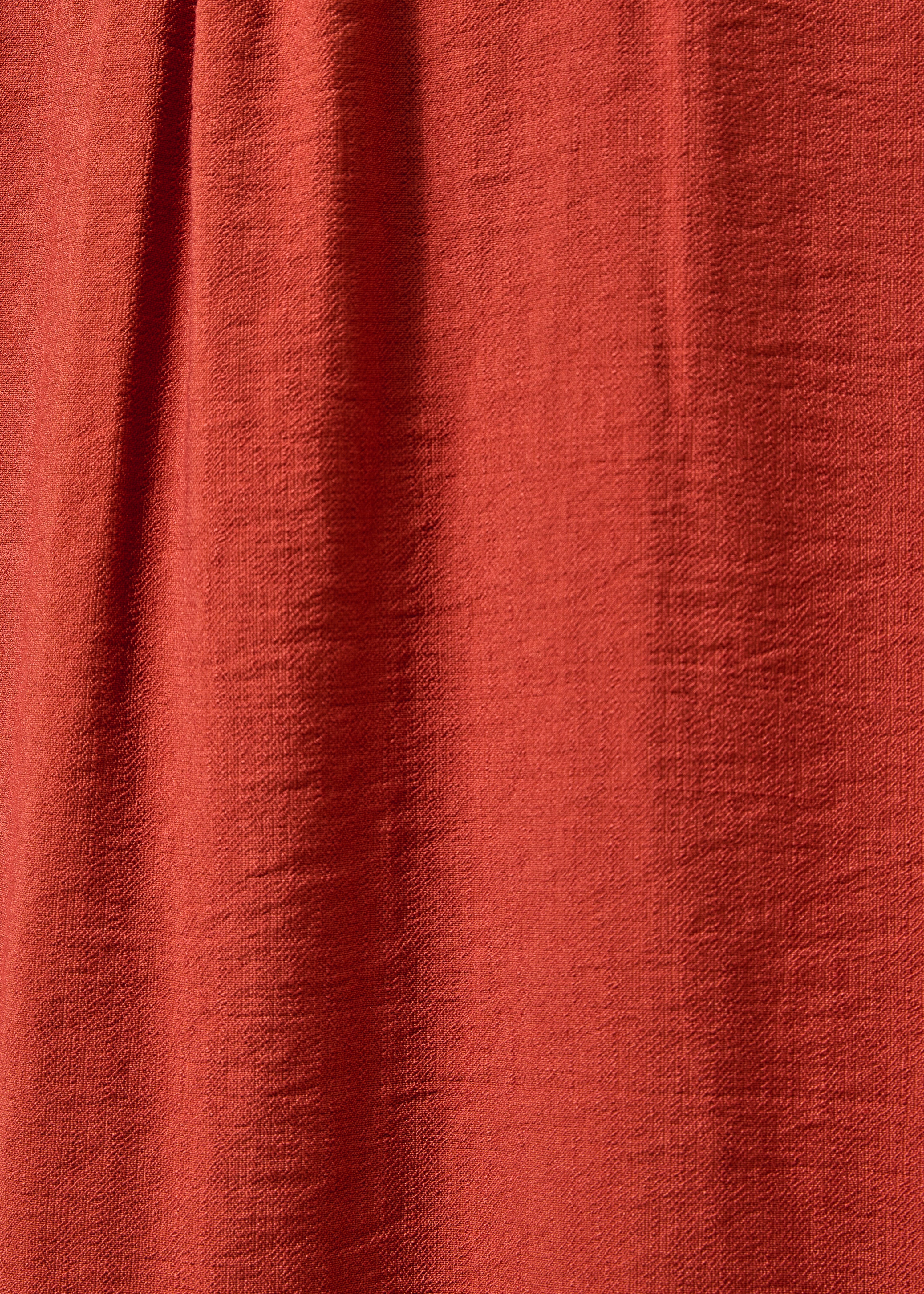 Abito lungo aderente terracotta con scollo a incrocio