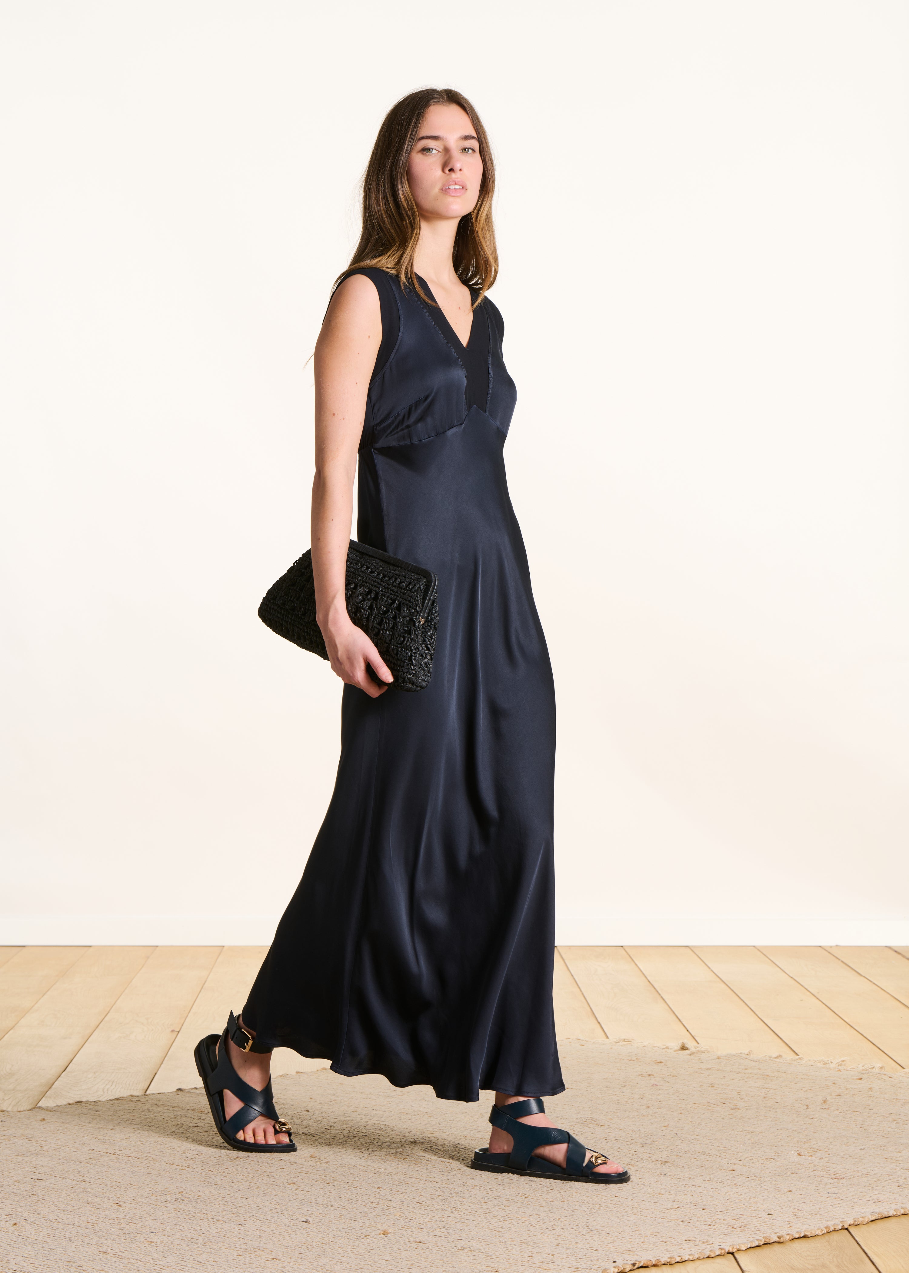 Dark blue sleeveless fluid long satin dress