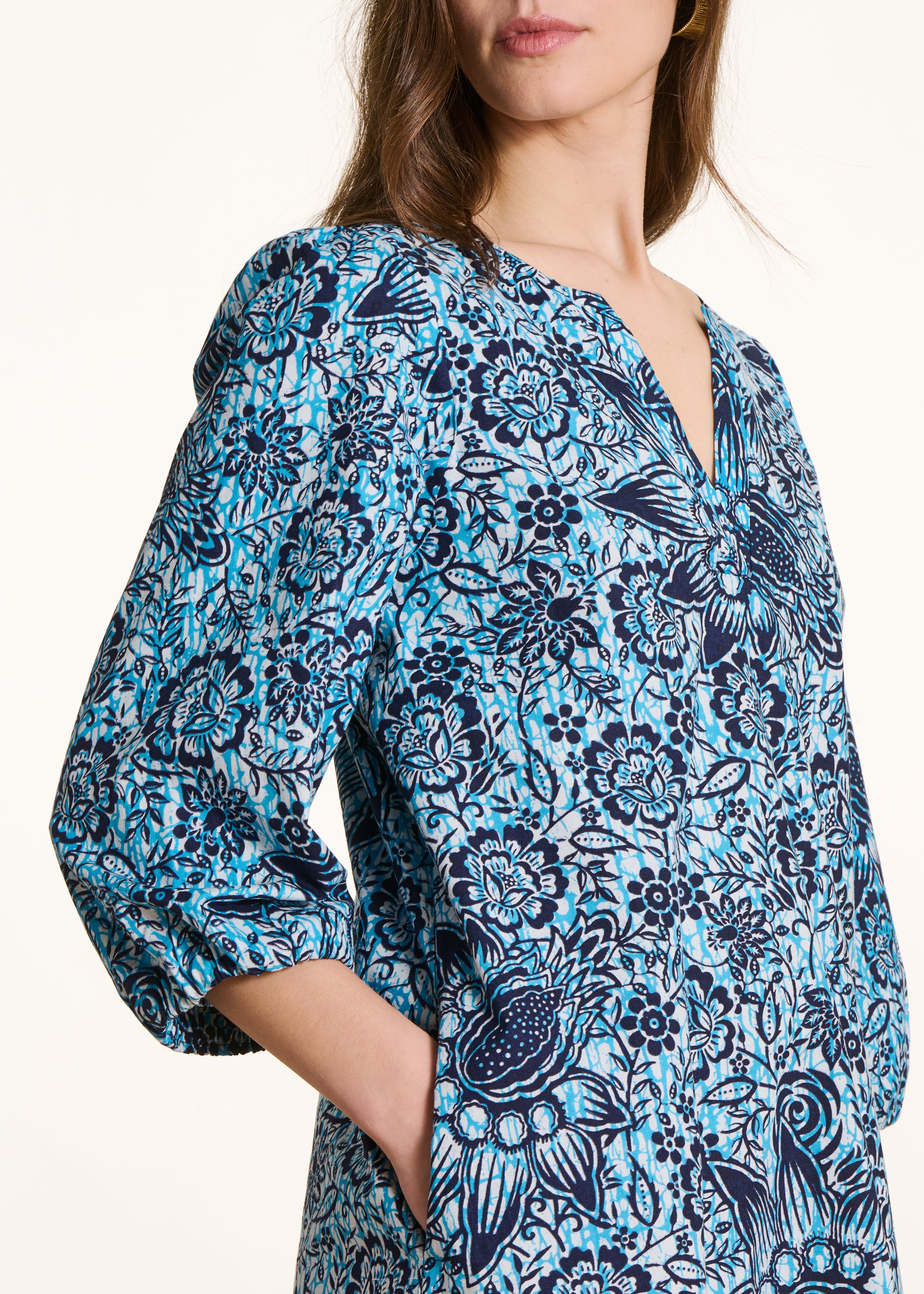 Blue short dress in cotton poplin with floral print