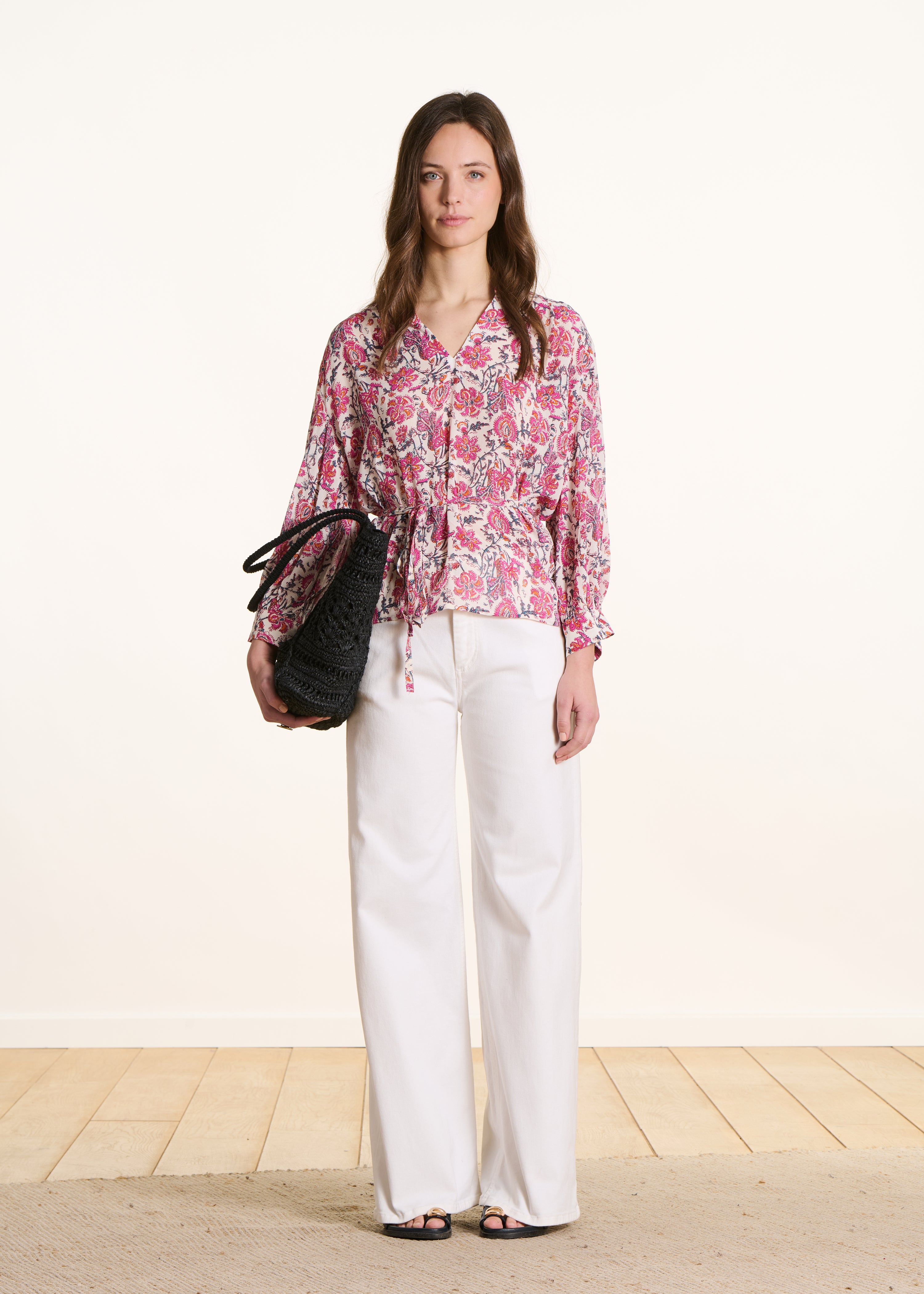 Top ample rose à imprimé floral manches longues
