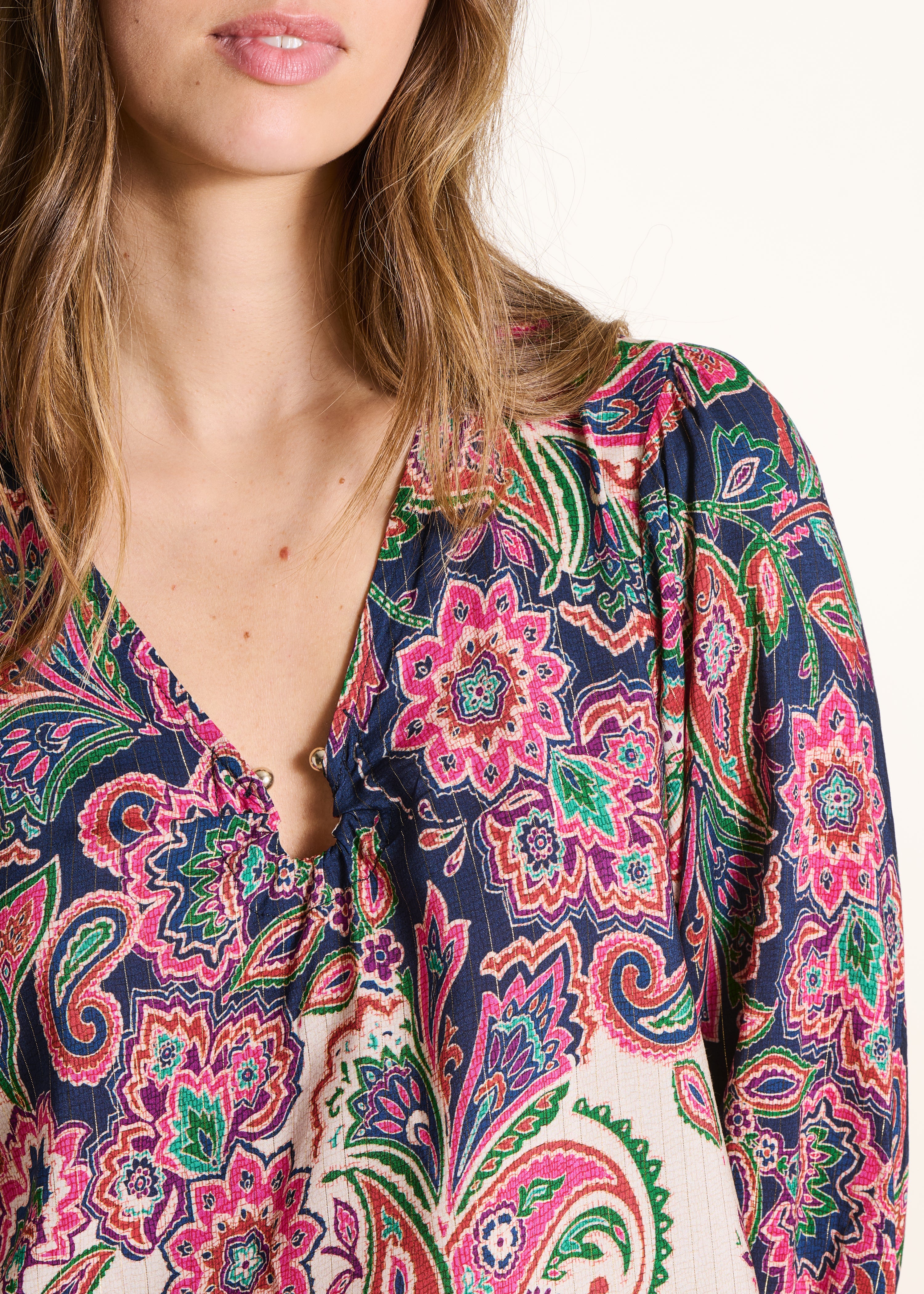 Pink and blue printed V-neck top with buckle