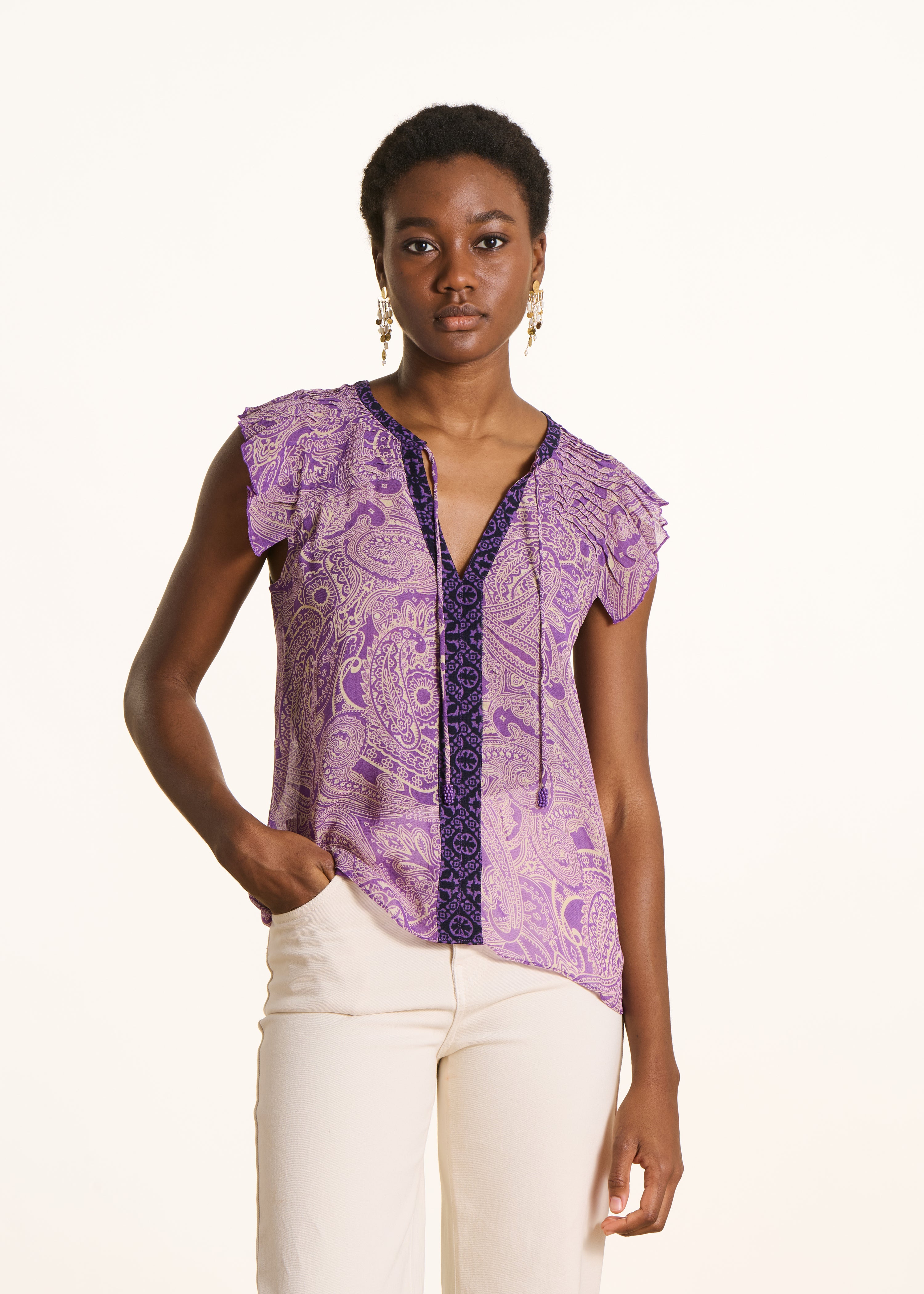 Mouwloze top van paarse voile met print