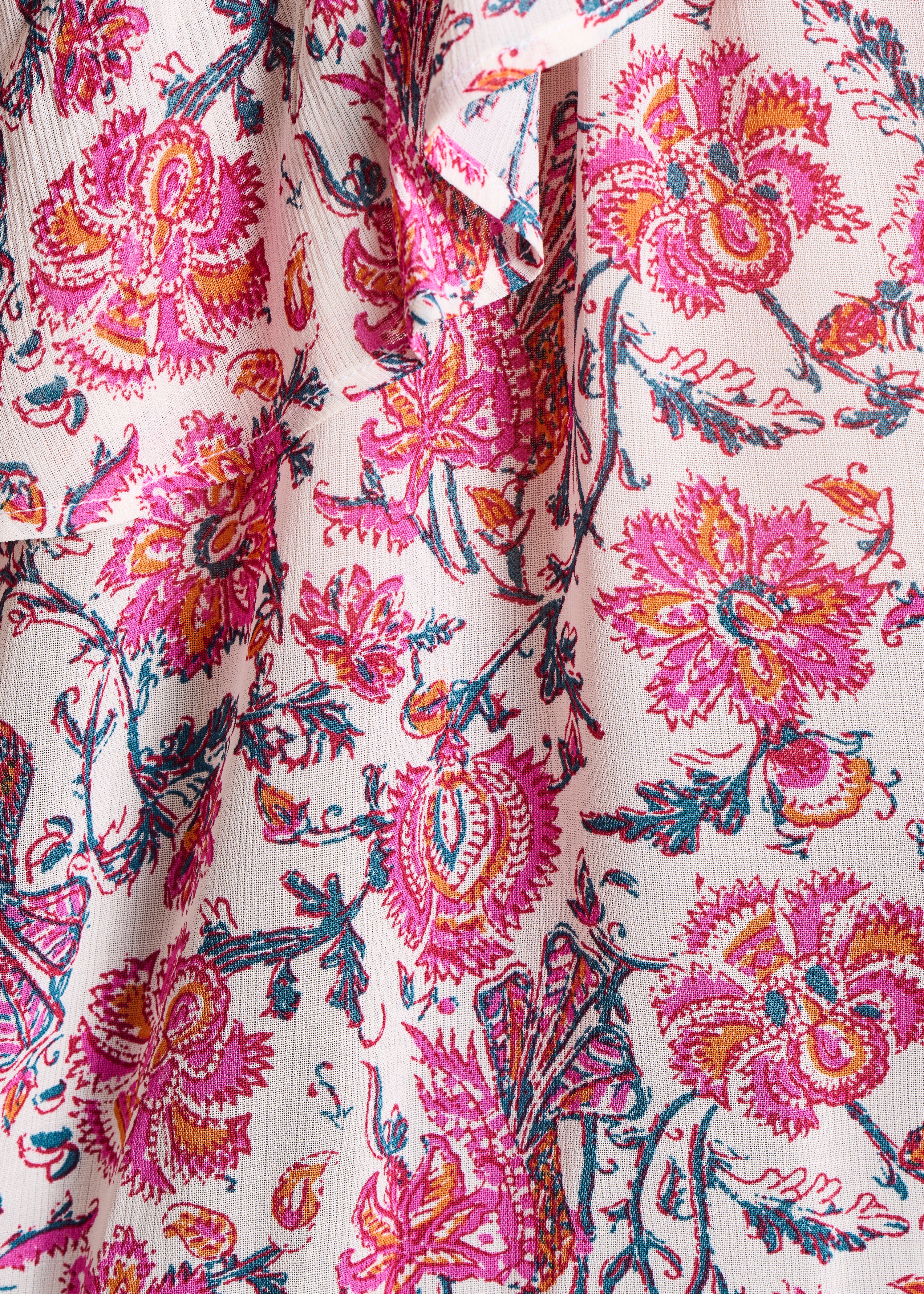 Short pink one-shoulder top with floral print