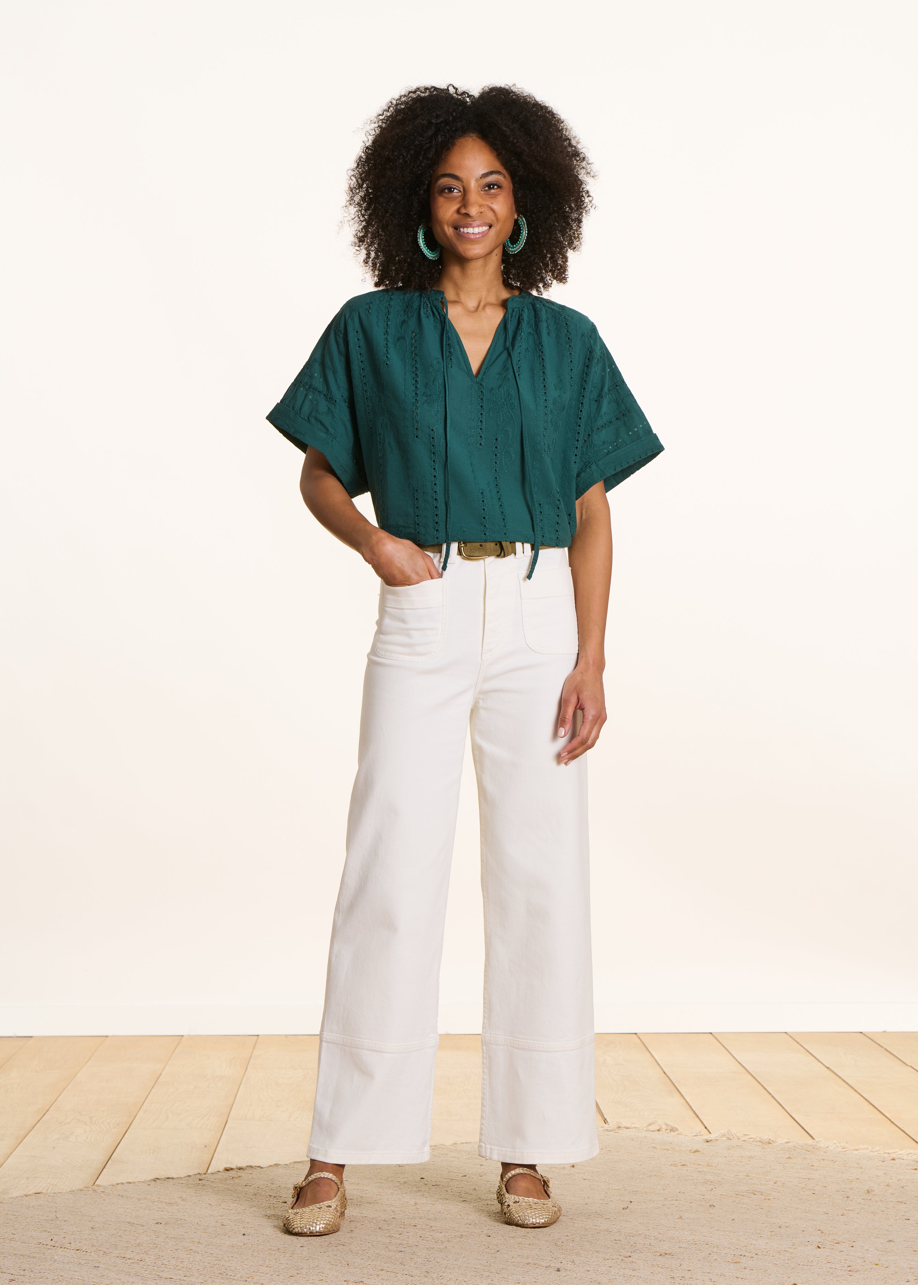 Loose blouse in dark green eyelet embroidery