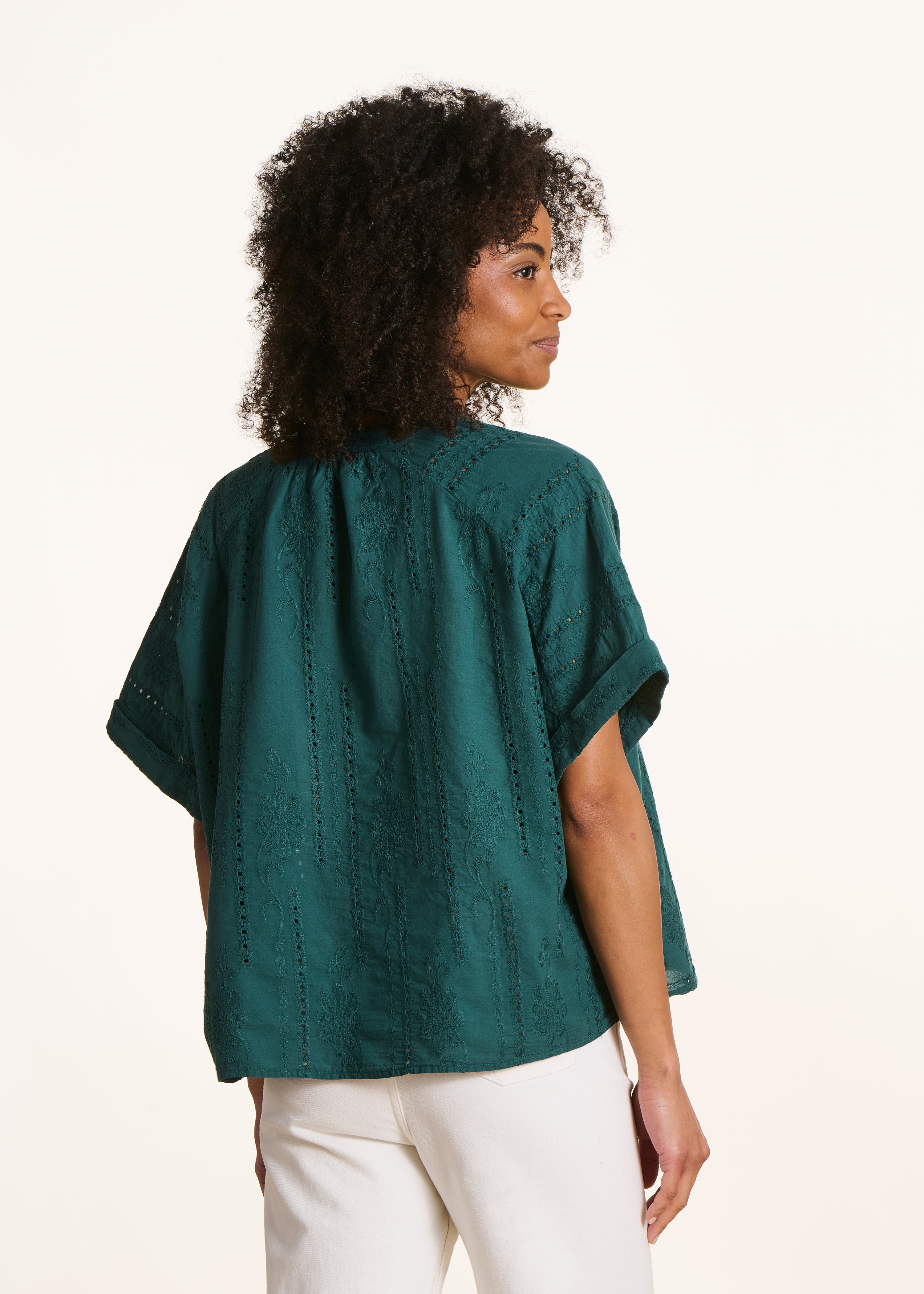 Loose blouse in dark green eyelet embroidery