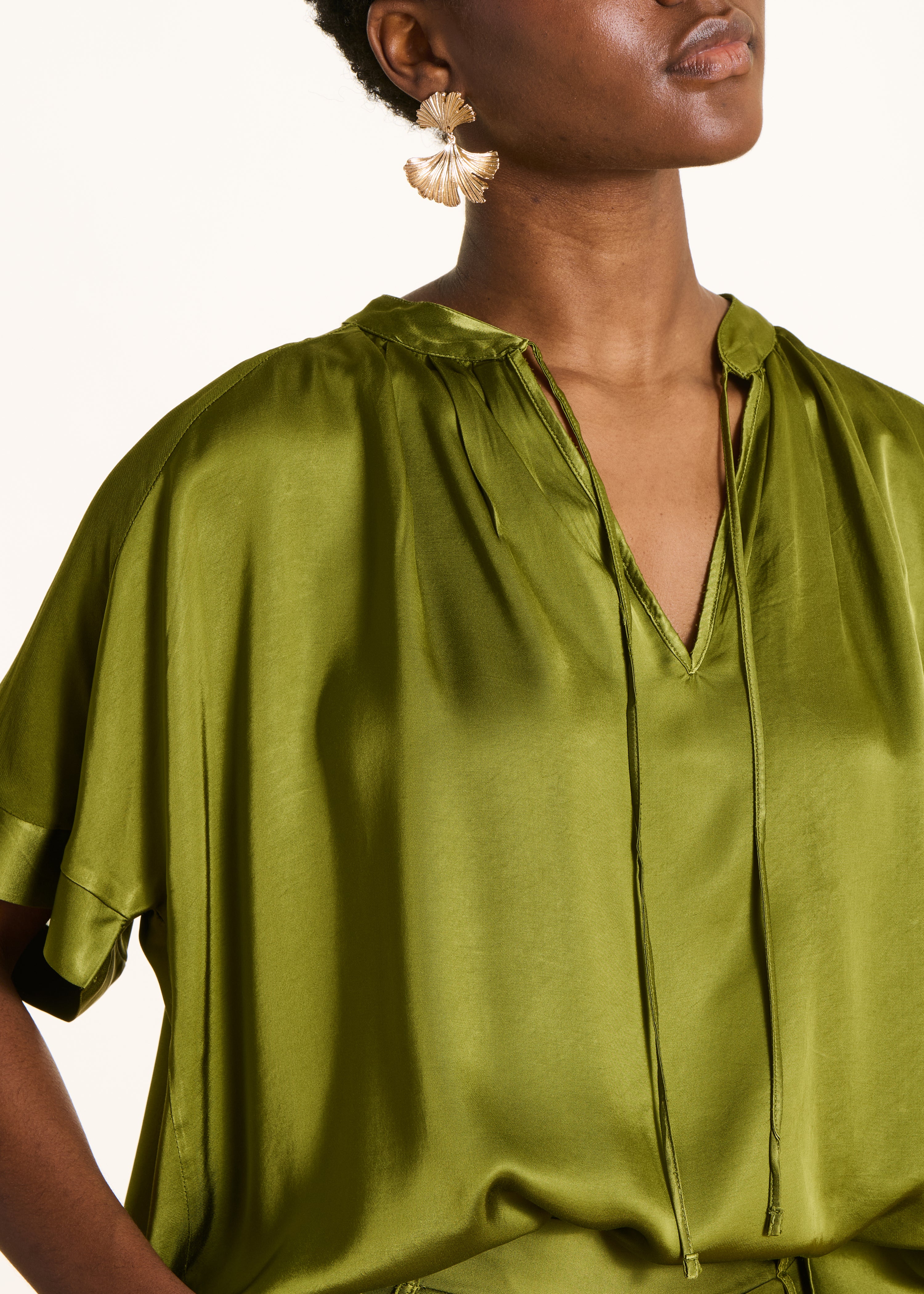 Loose green satin blouse
