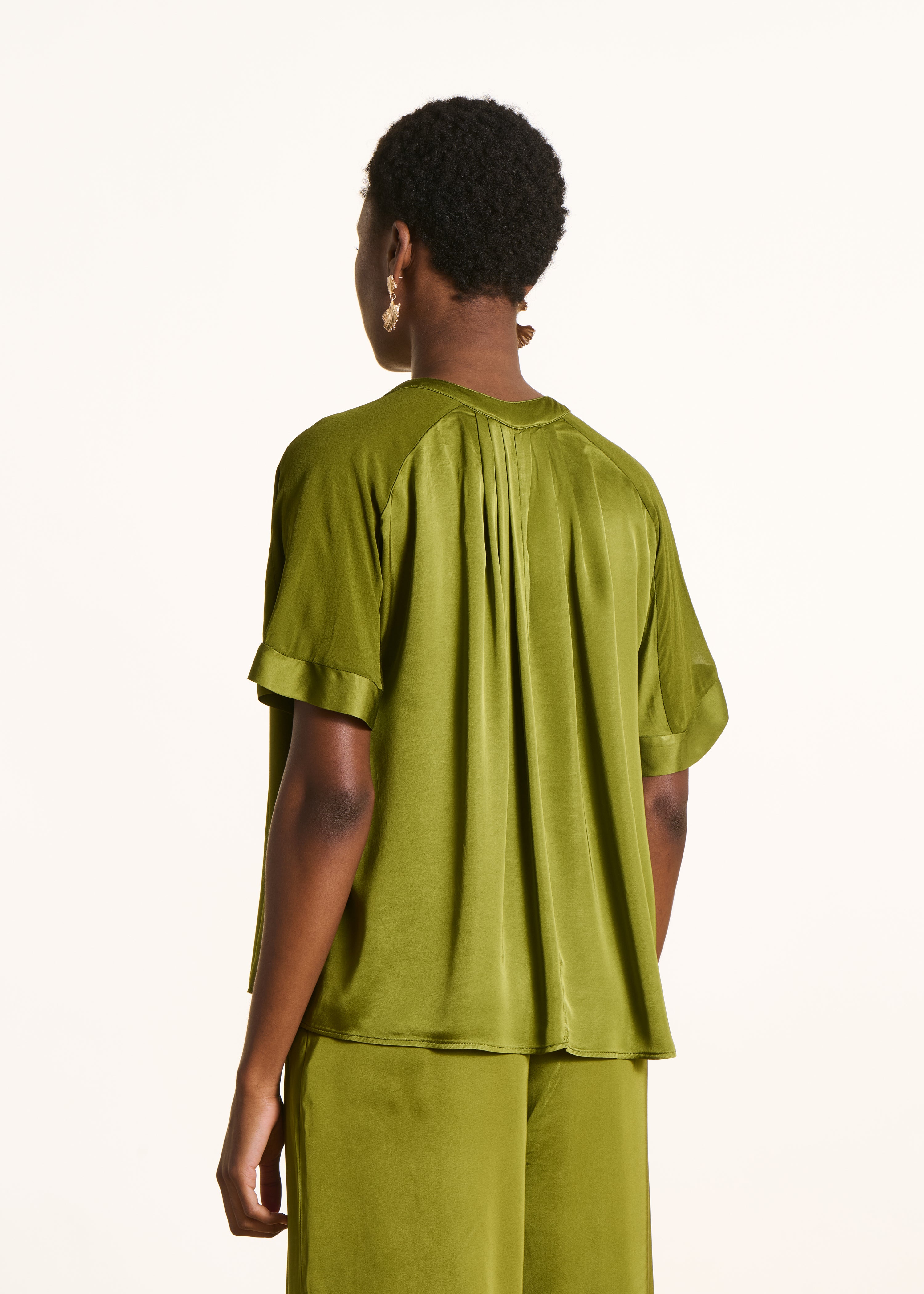 Loose green satin blouse