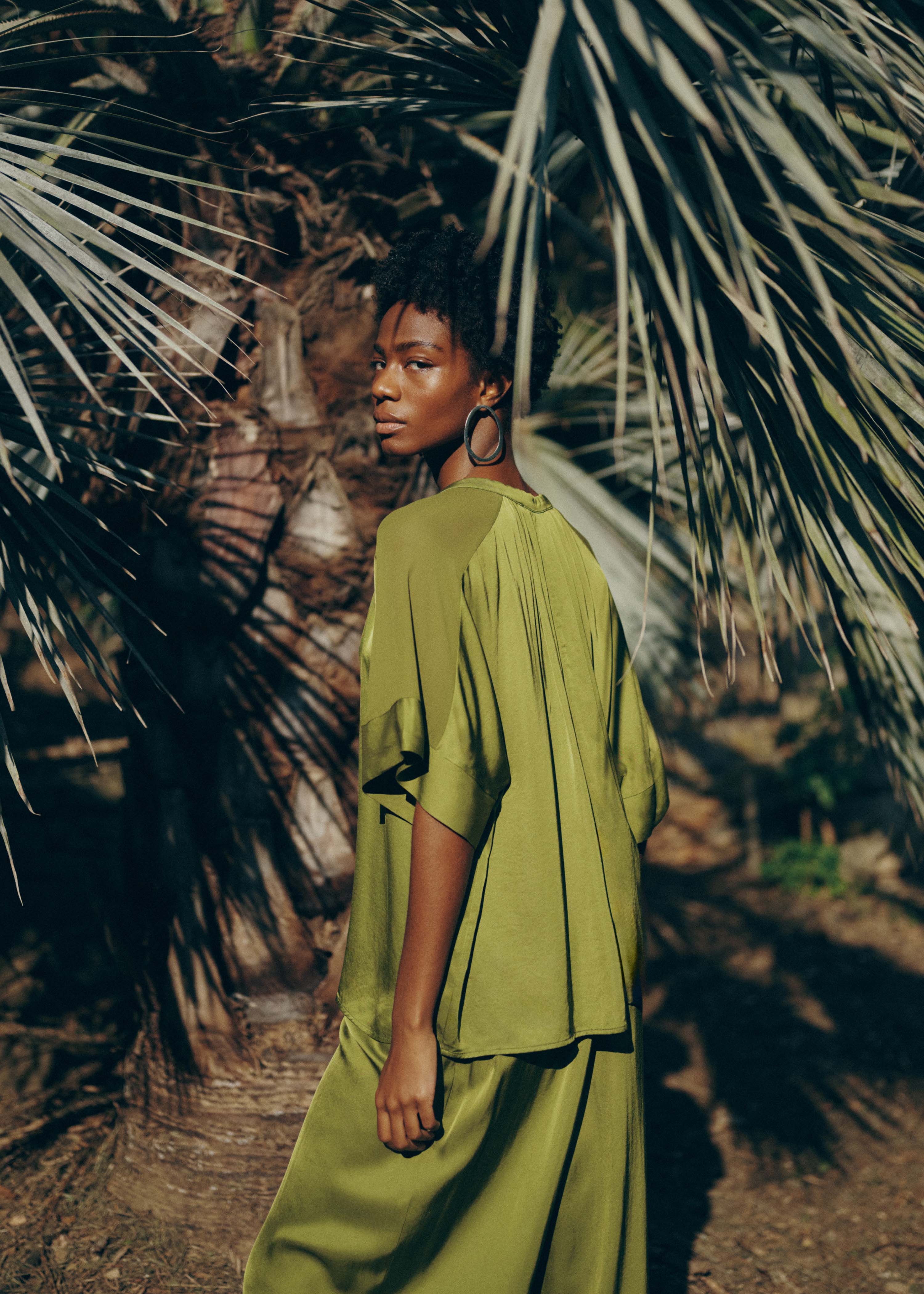 Loose green satin blouse