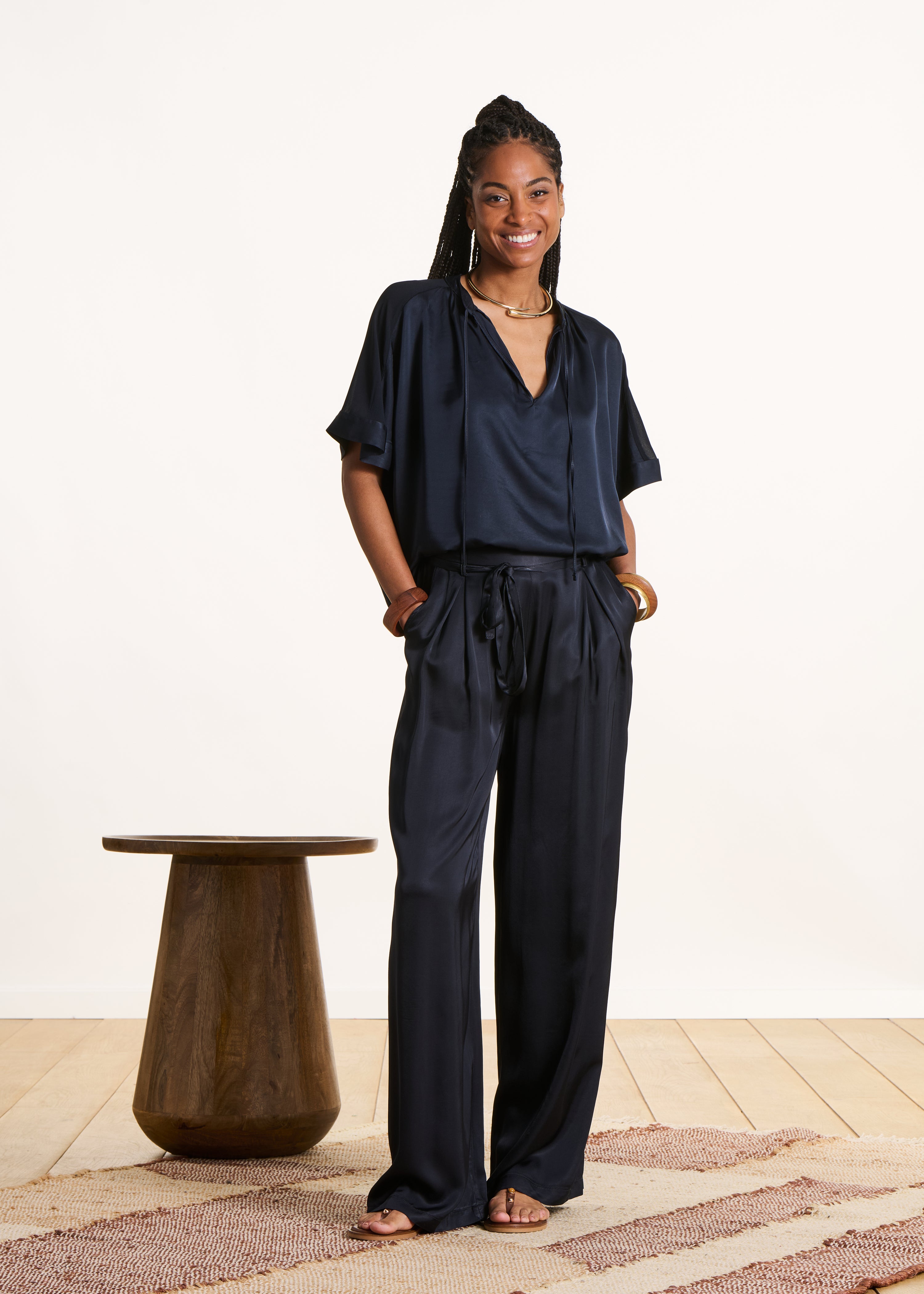 Loose dark blue satin blouse with Tunisian neckline