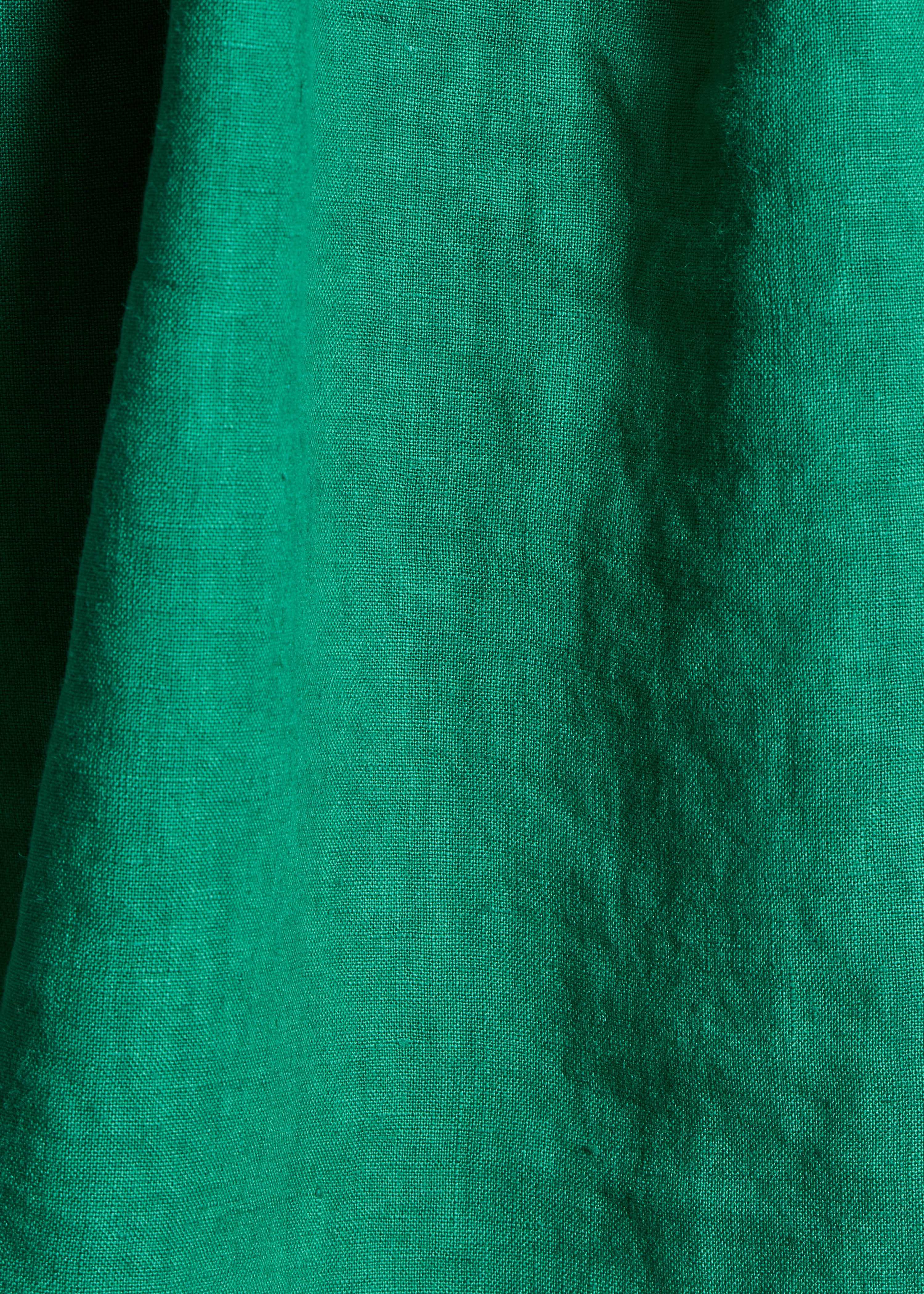 Loose green linen top with short sleeves
