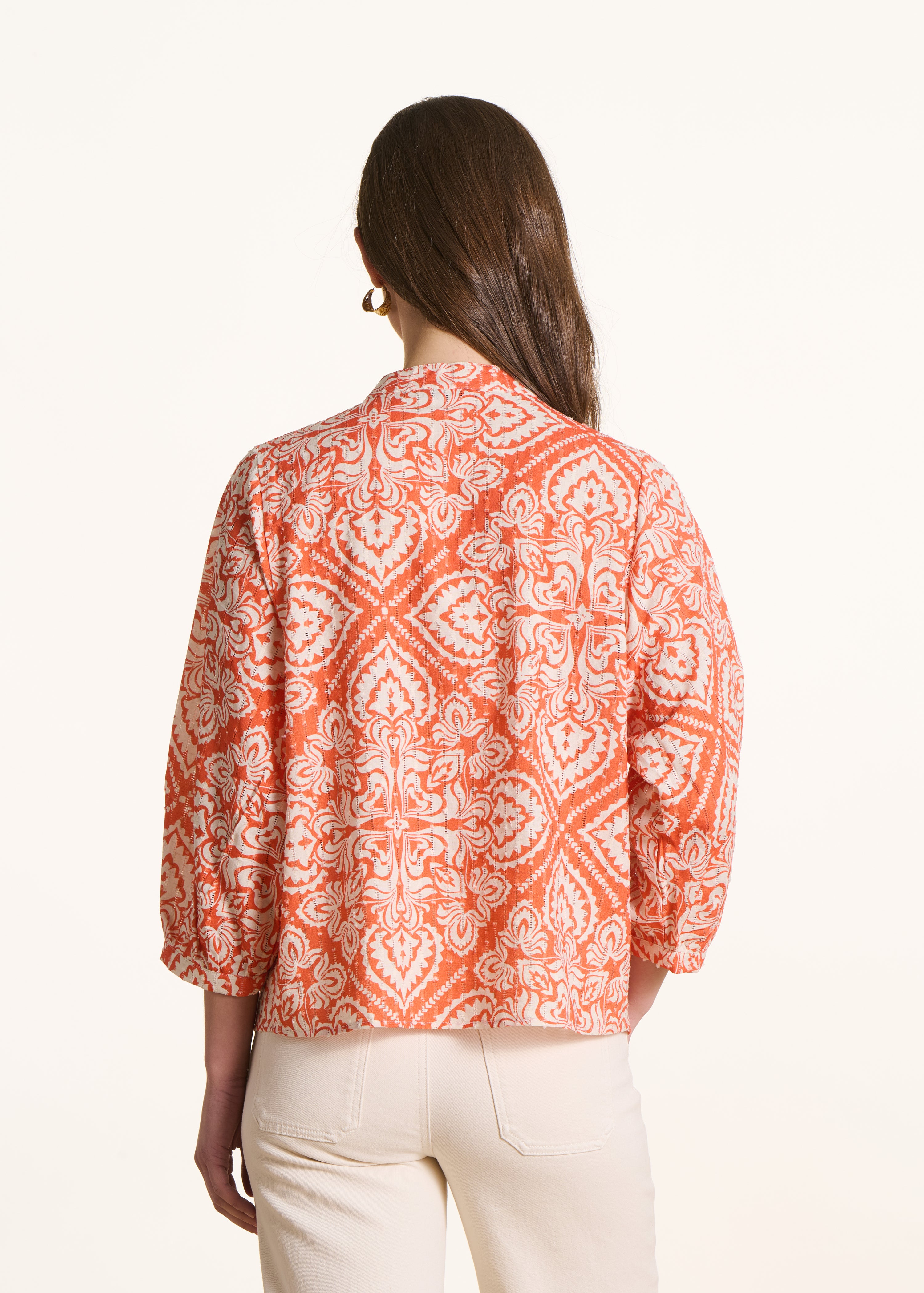 Top orange ajouré à imprimé floral manches courtes