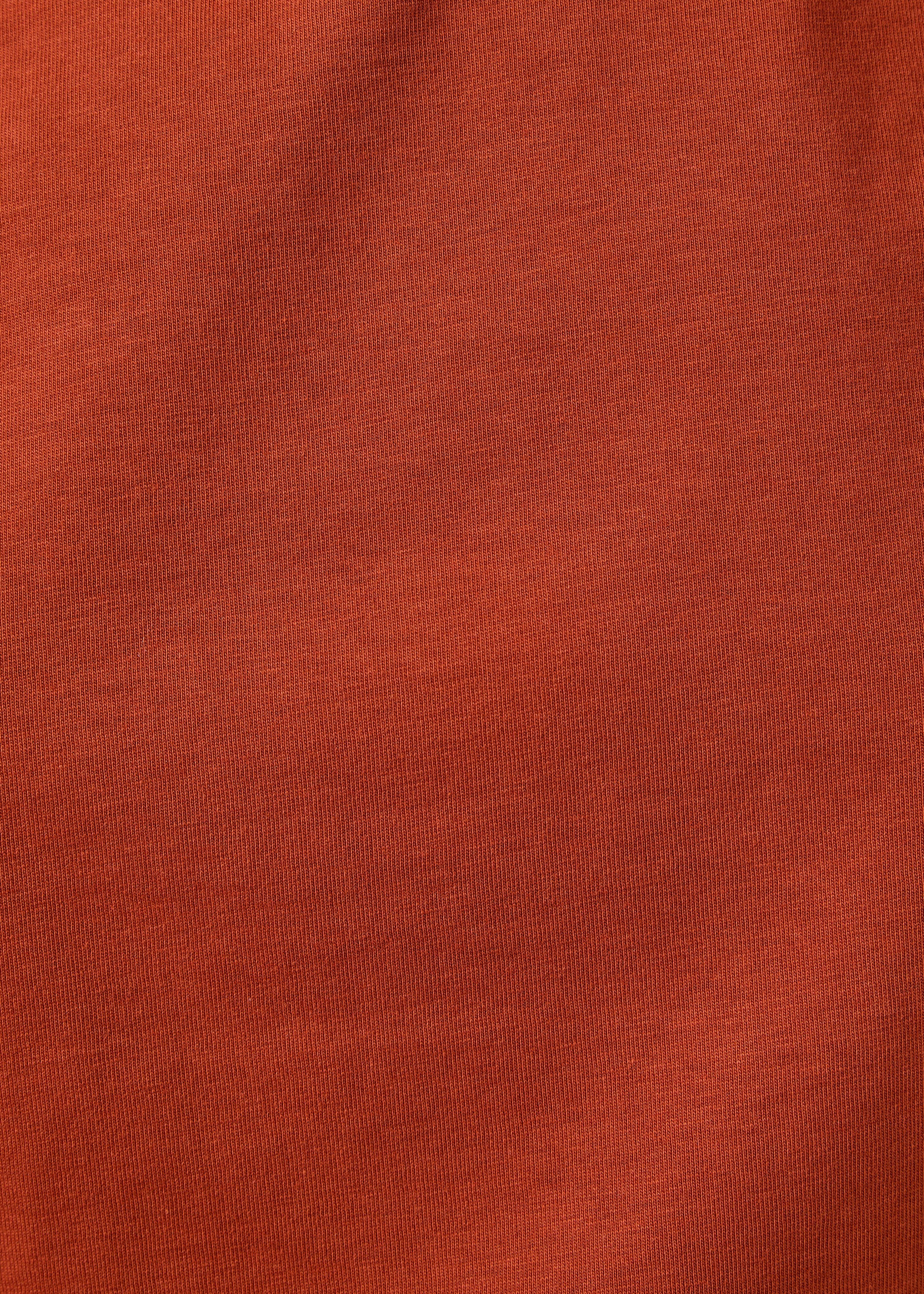T-shirt laranja de manga curta em algodão biológico