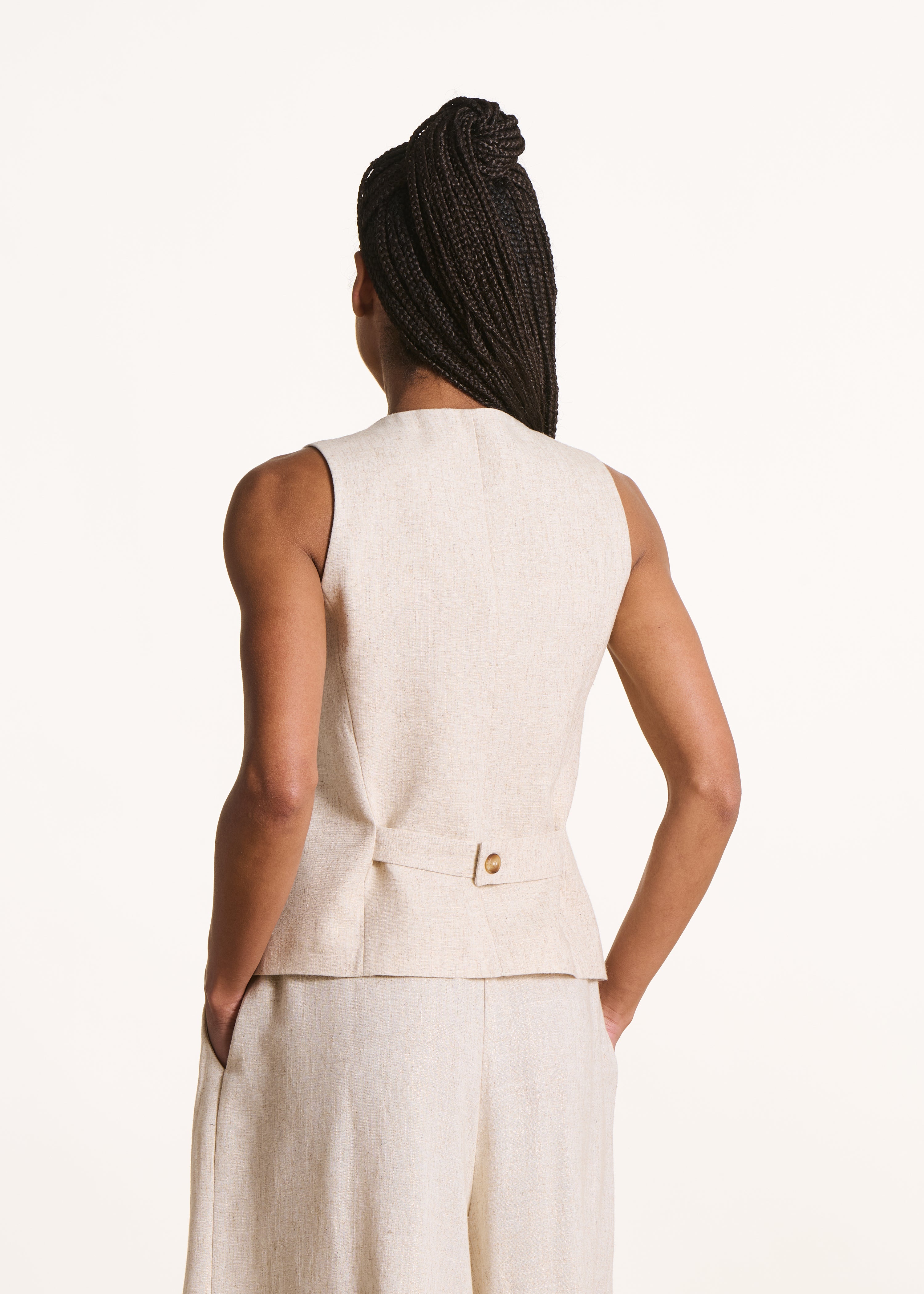 Chaleco beige iridiscente sin mangas