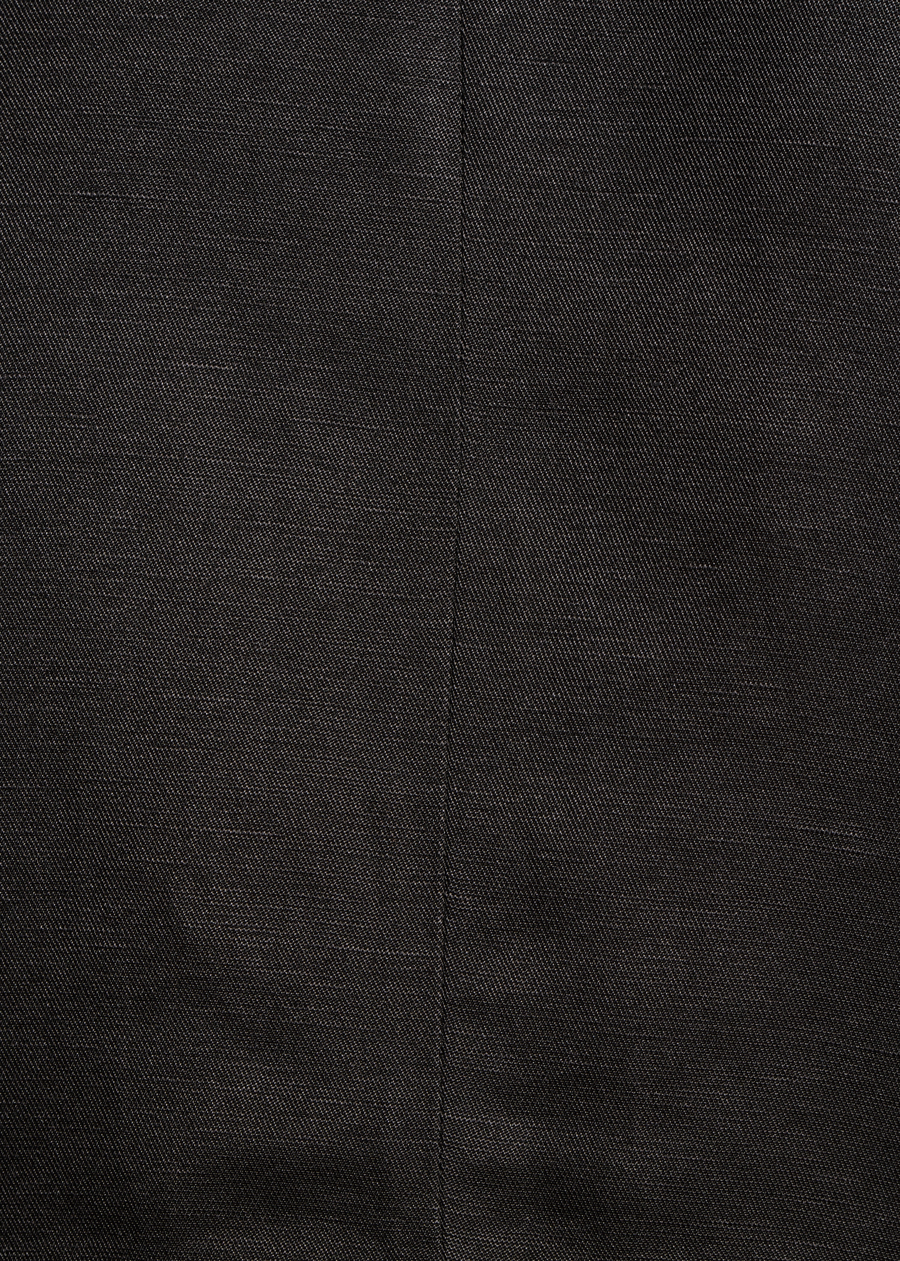 Veste courte noire irisée ouverte