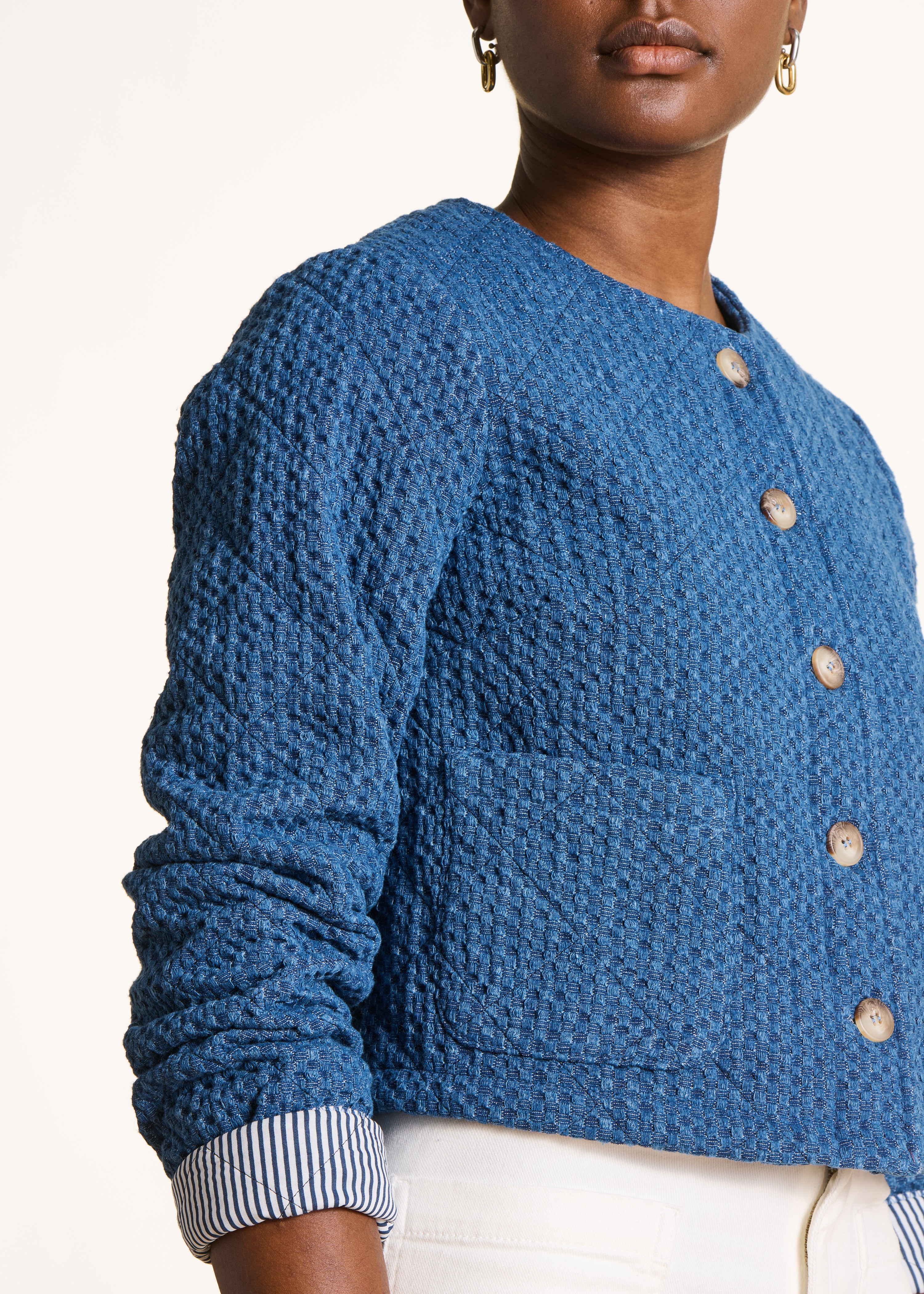 Short jacket in embossed denim