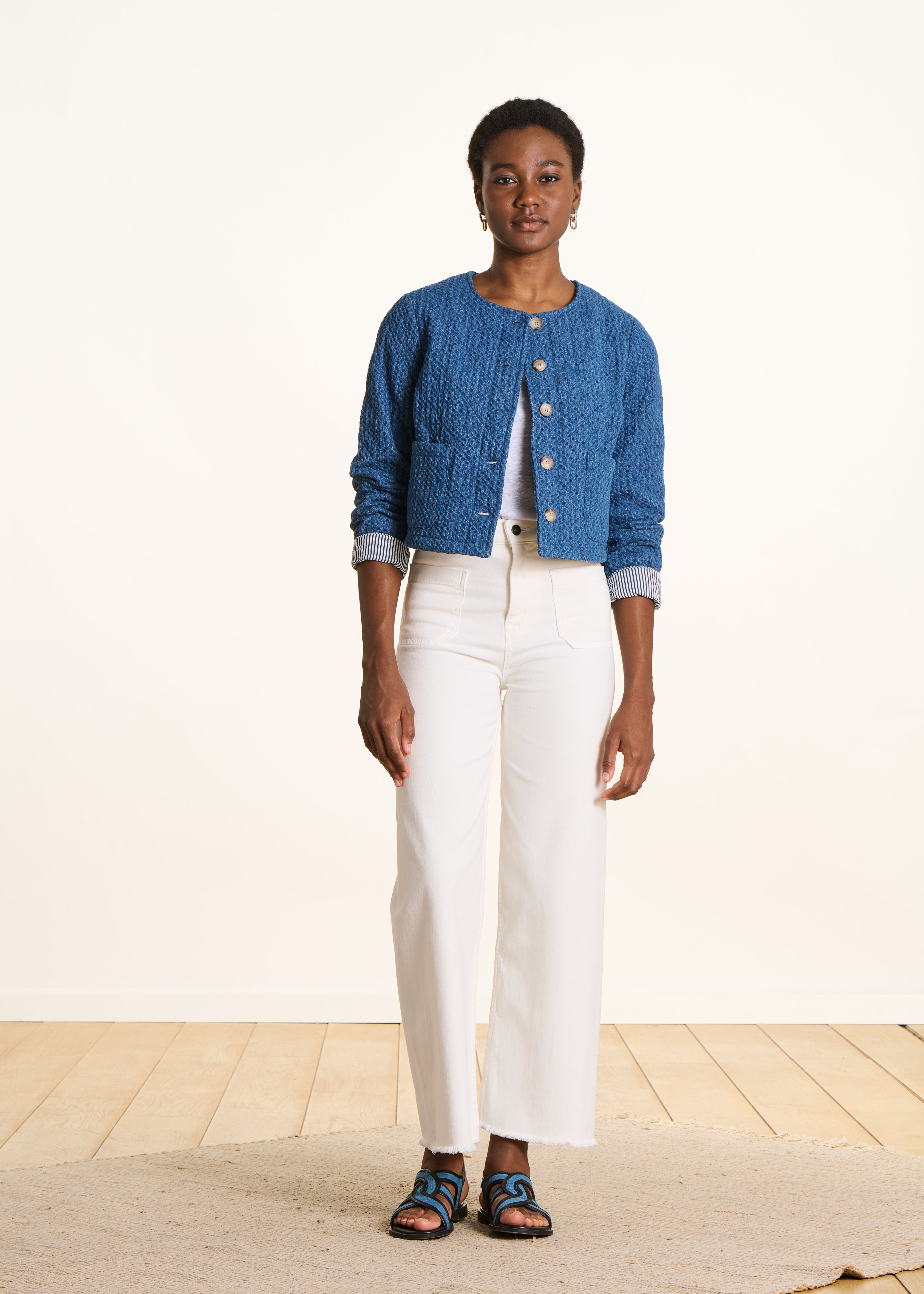 Short jacket in embossed denim